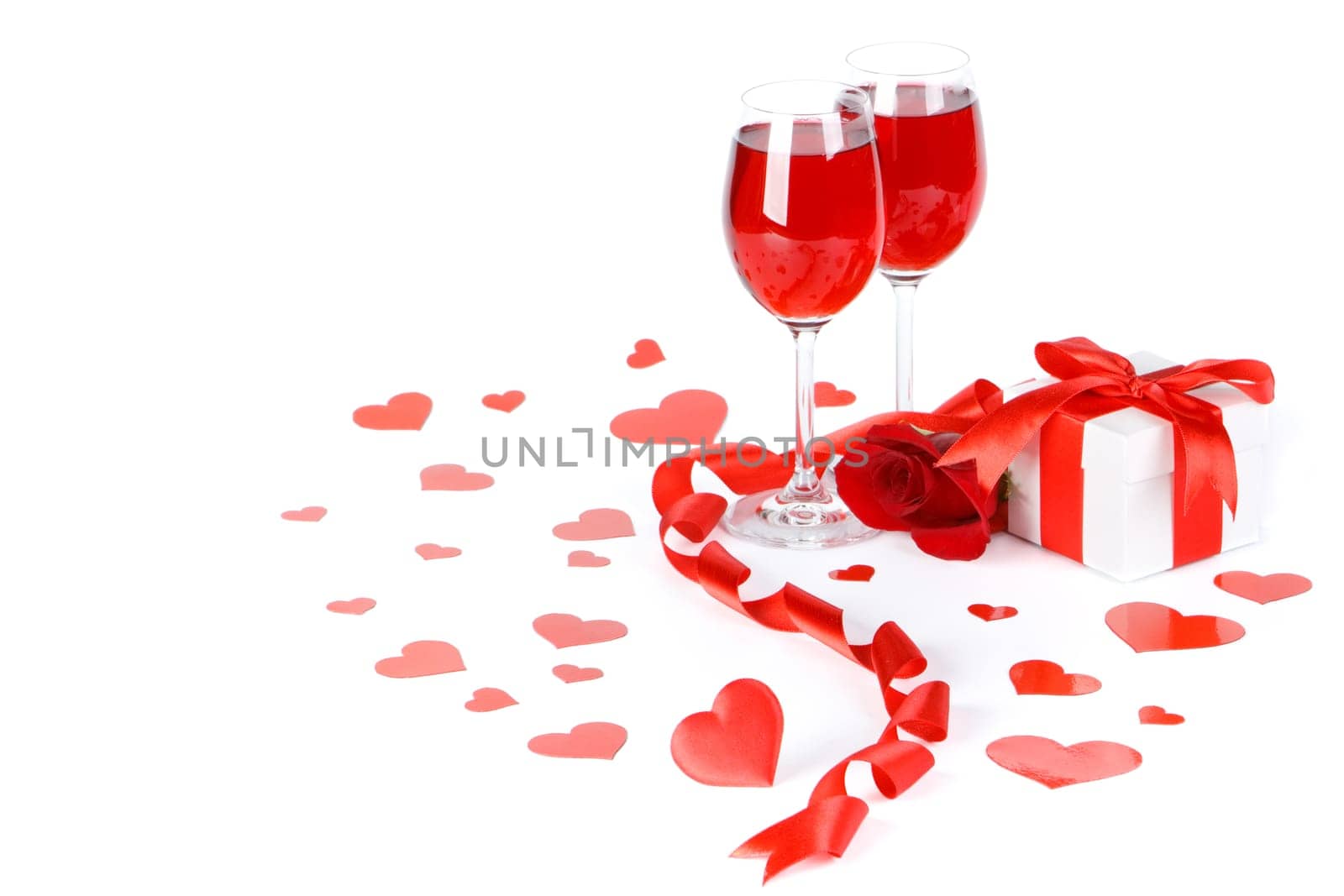 Gift box and rose on a white background. Valentine&#039 s day card.
