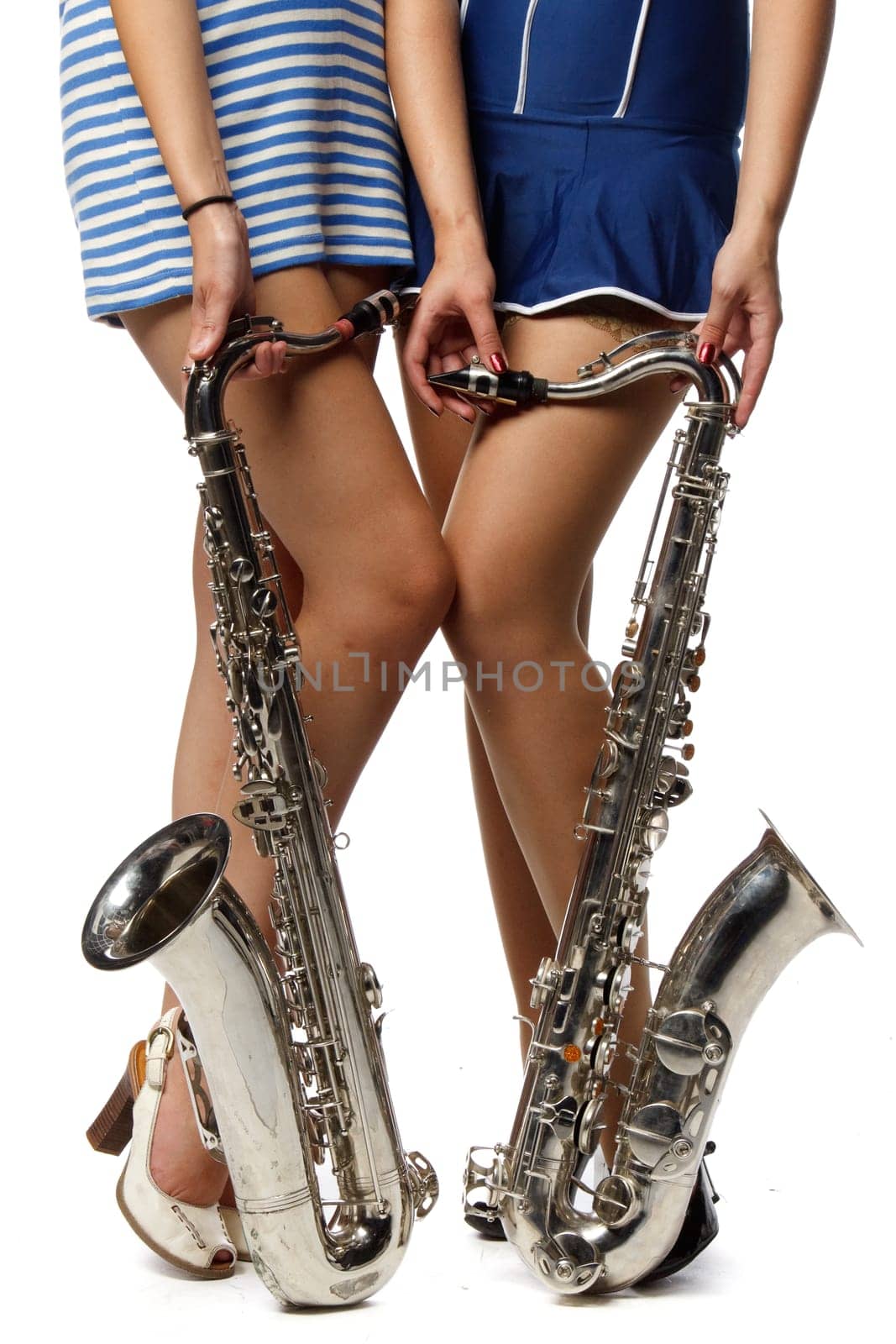Girl with saxophone on a white background