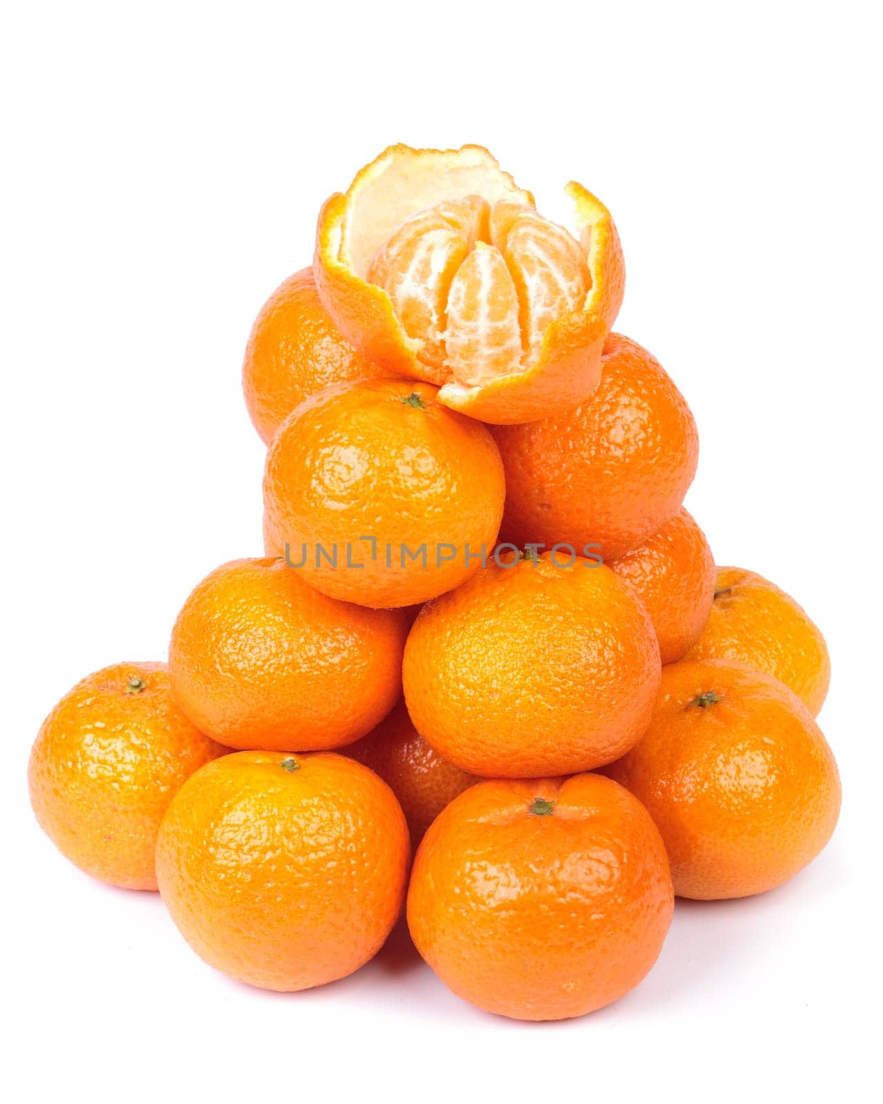 Fresh tangerines on a white background. Close up.
