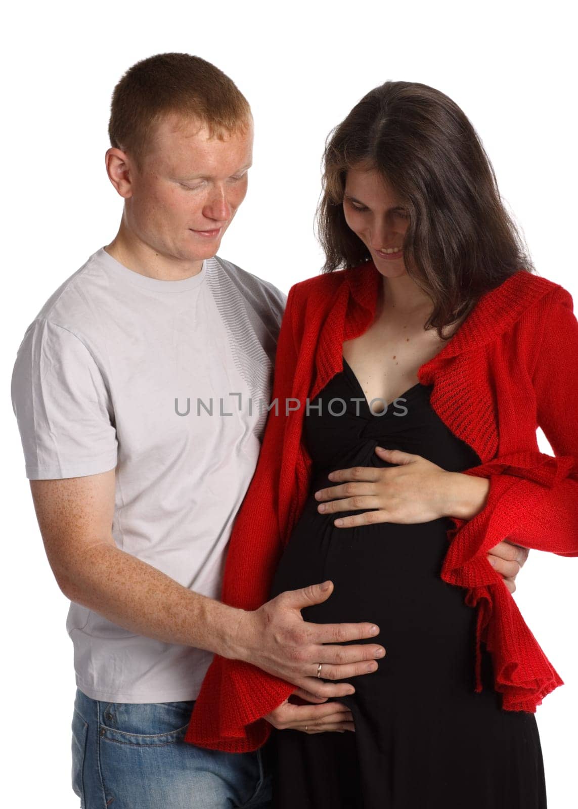 The happy pregnant woman with the husband on a white background.