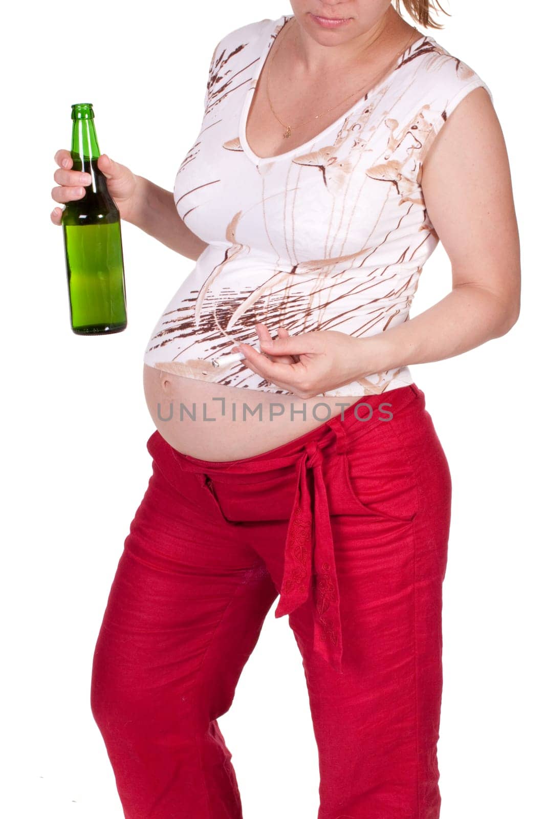 The pregnant woman with a bottle of beer and a cigarette on a white background