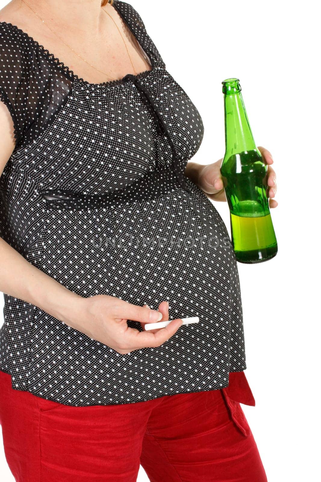 The pregnant woman with a bottle of beer and a cigarette on a white background