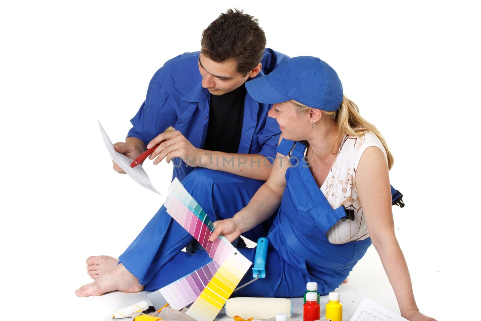 The pregnant woman together with the husband plan an interior of a children&#039 s room