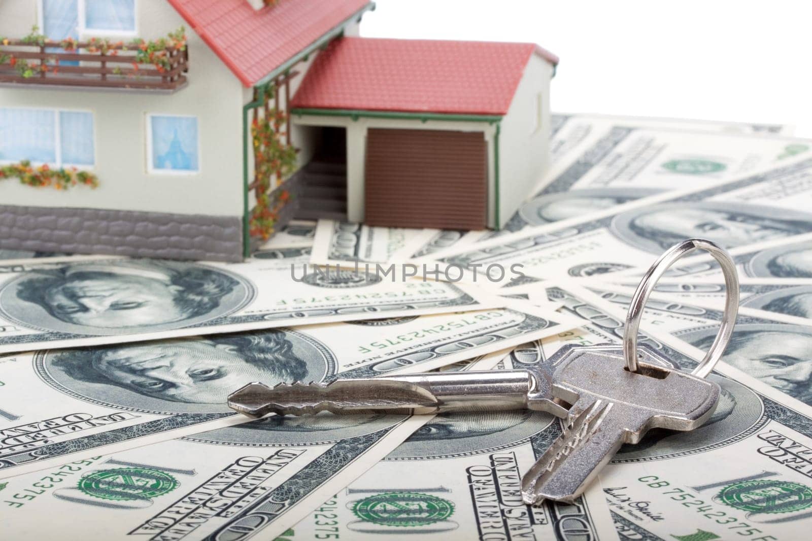Miniature House and Money. Buying house concept