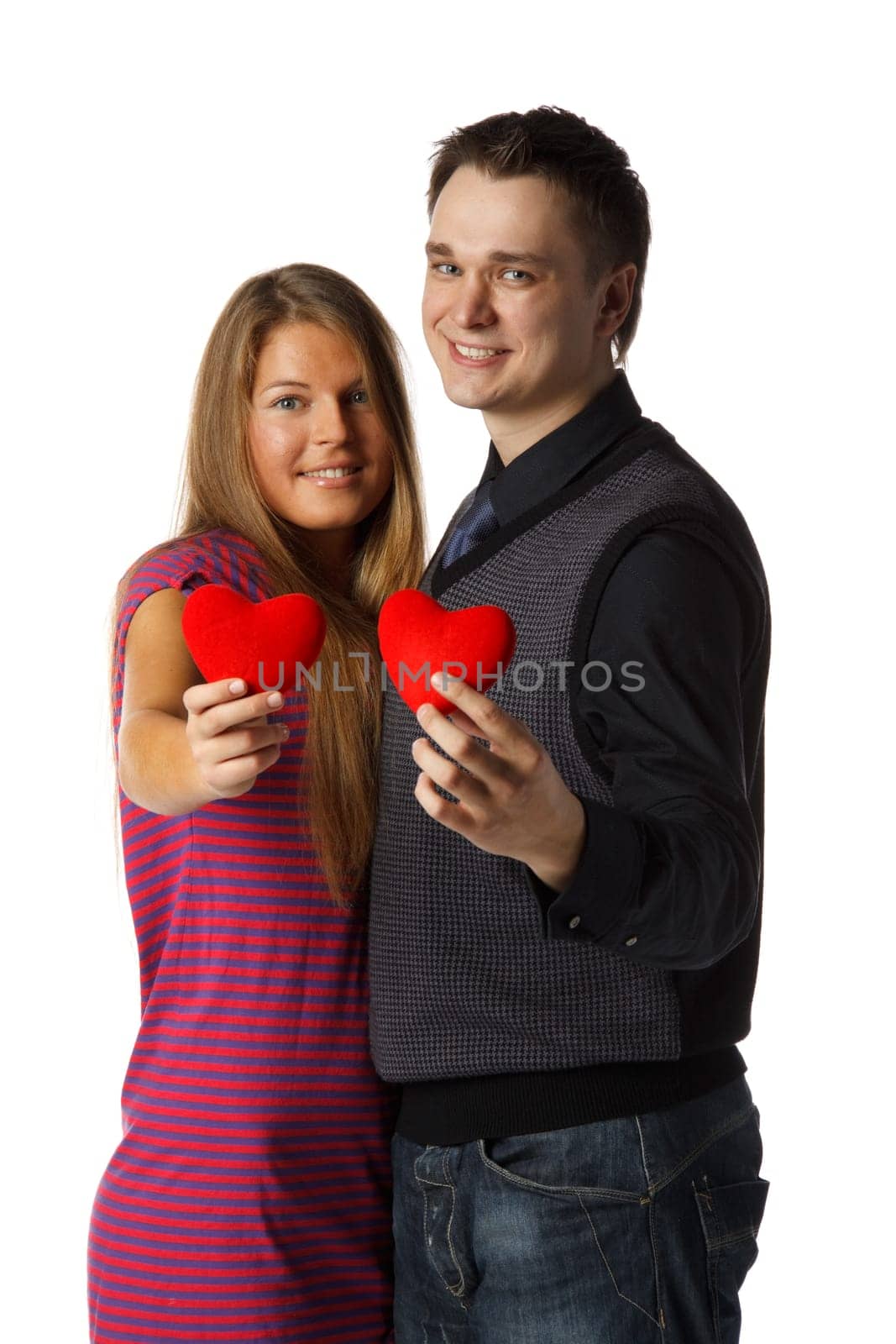 Young enamoured couple with a heart on a white background.