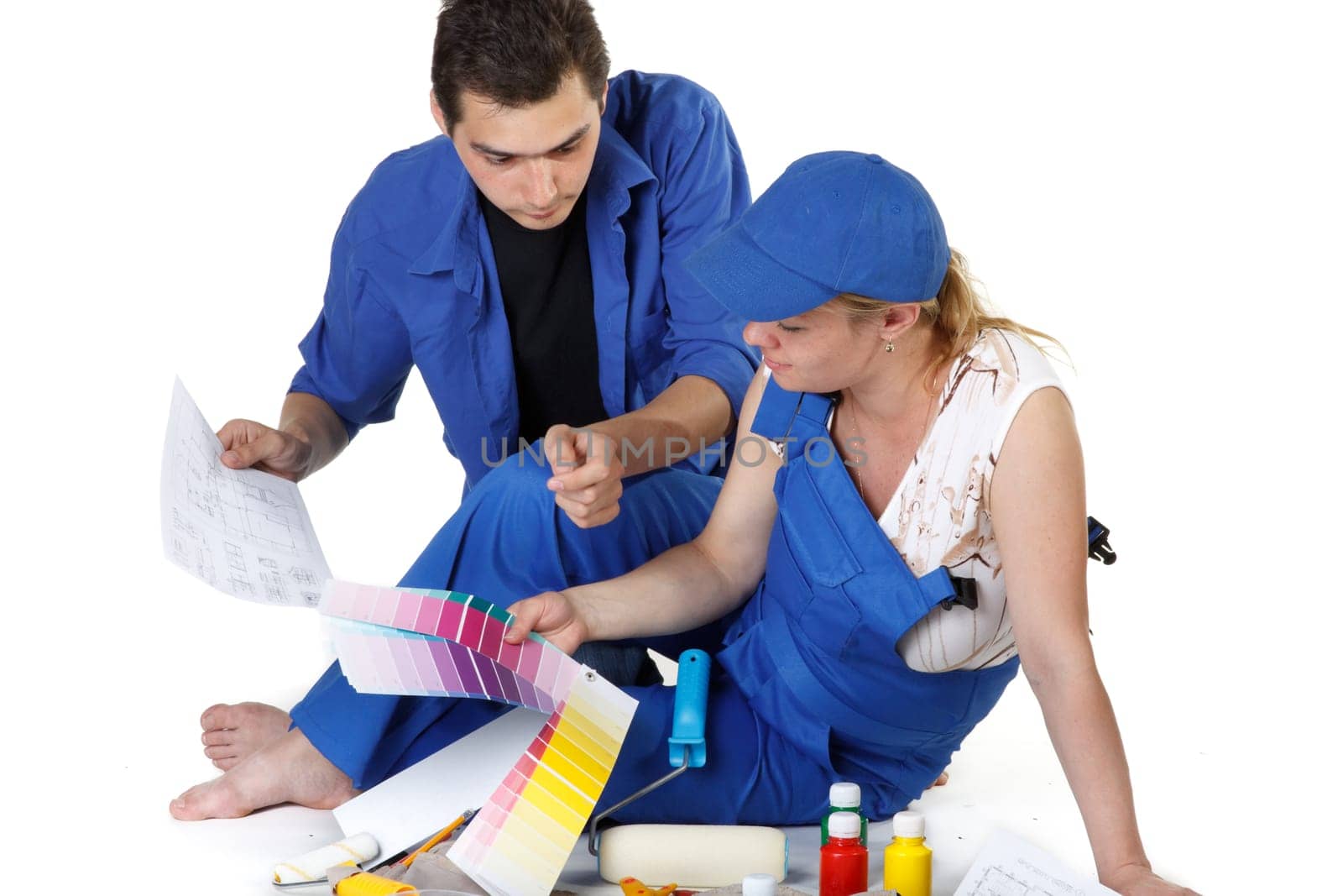 The pregnant woman together with the husband plan an interior of a children&#039 s room