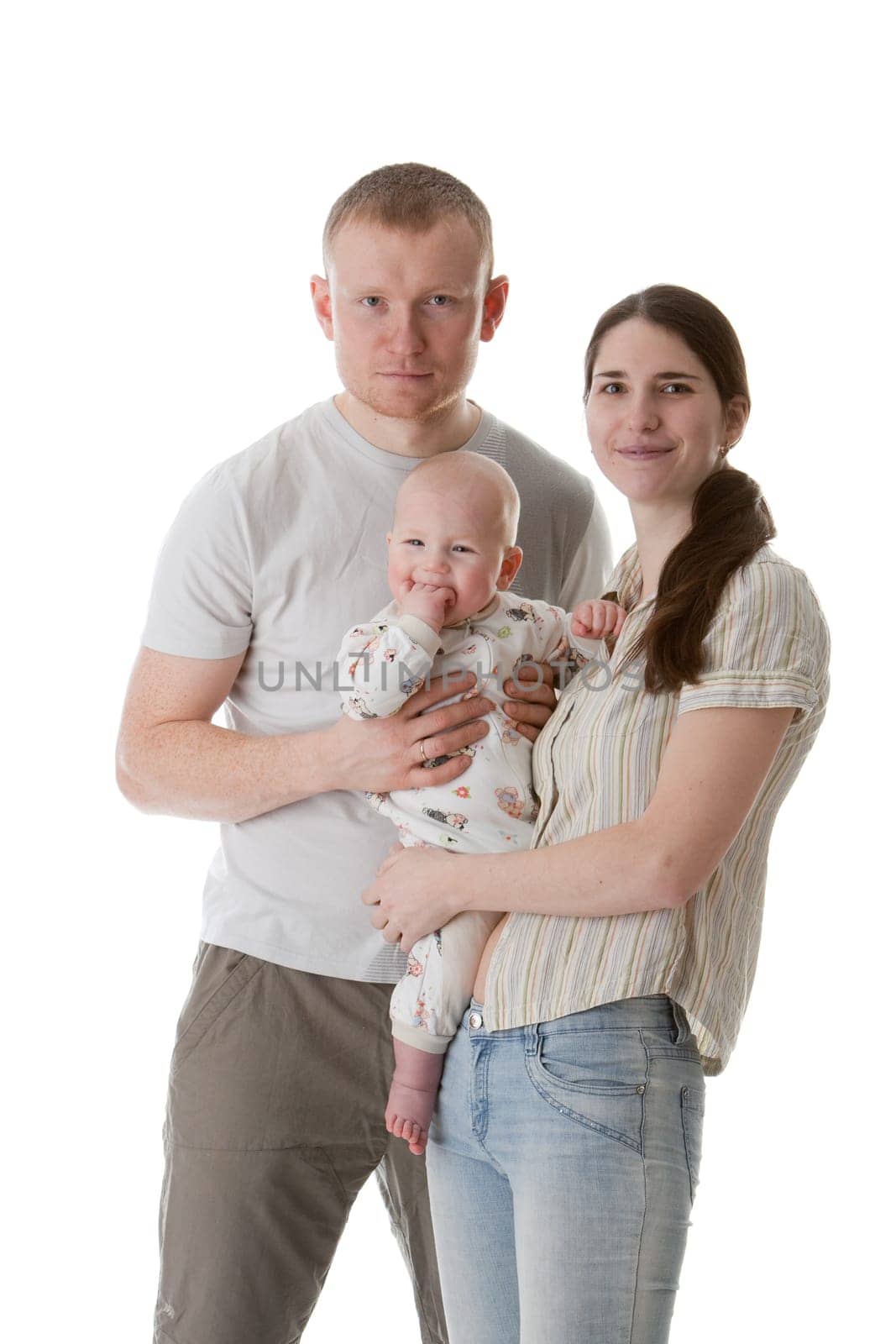 Happy family. Father, mother and sweet baby on a white background.