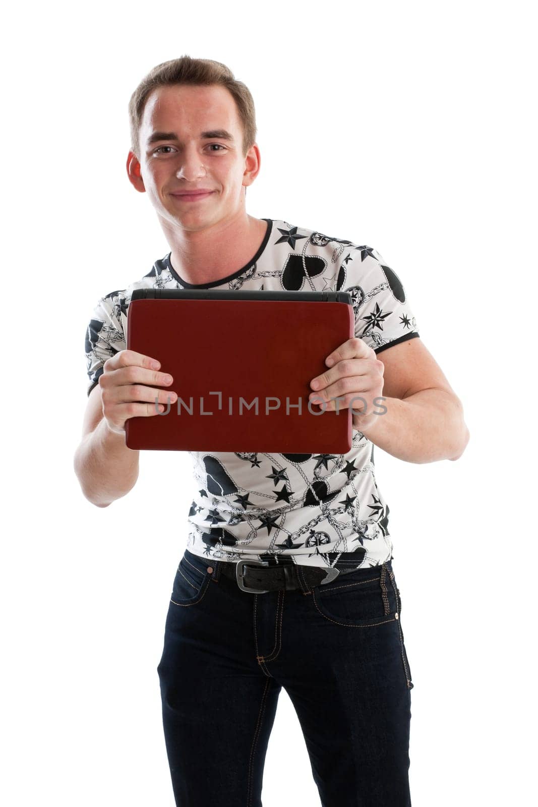 Student stands with the laptop on a white background.