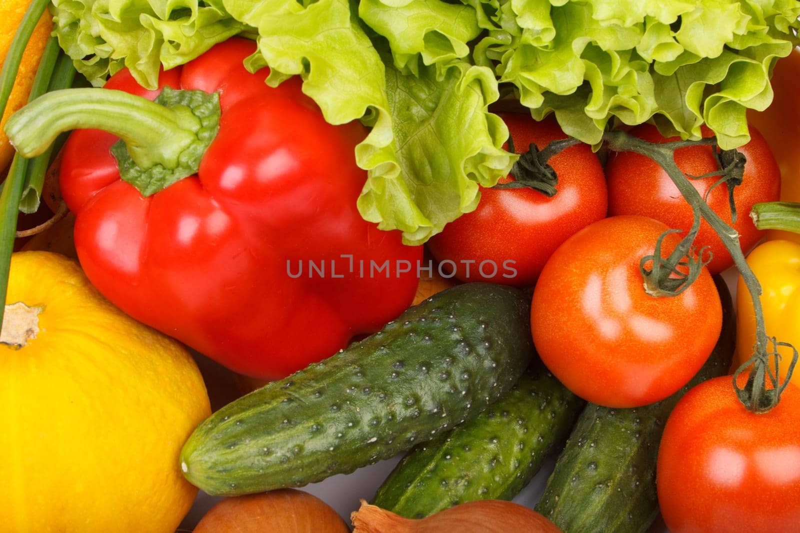 Abstract background from fresh vegetables on a white background.