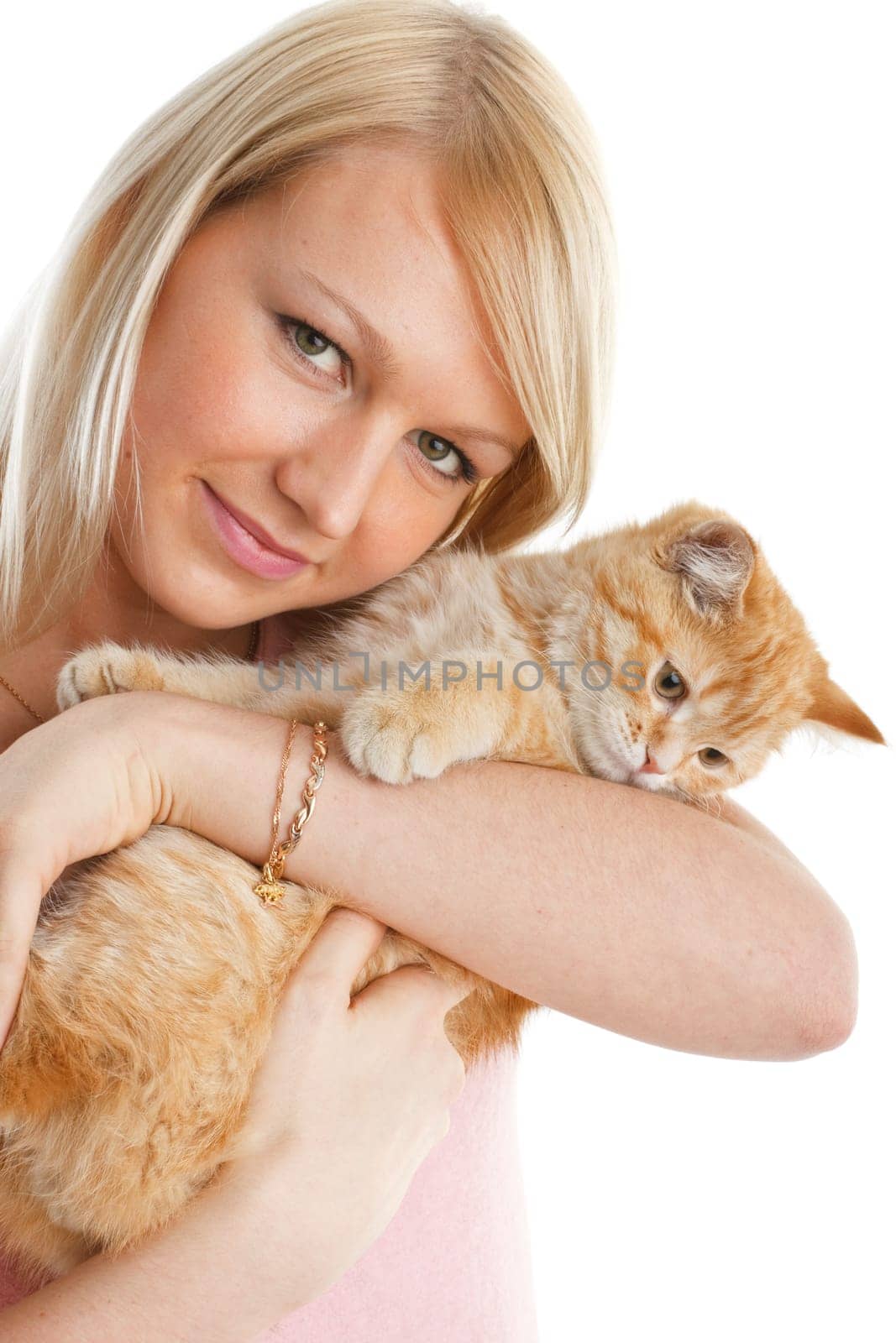 The happy young woman with a small amusing kitten on a white background.