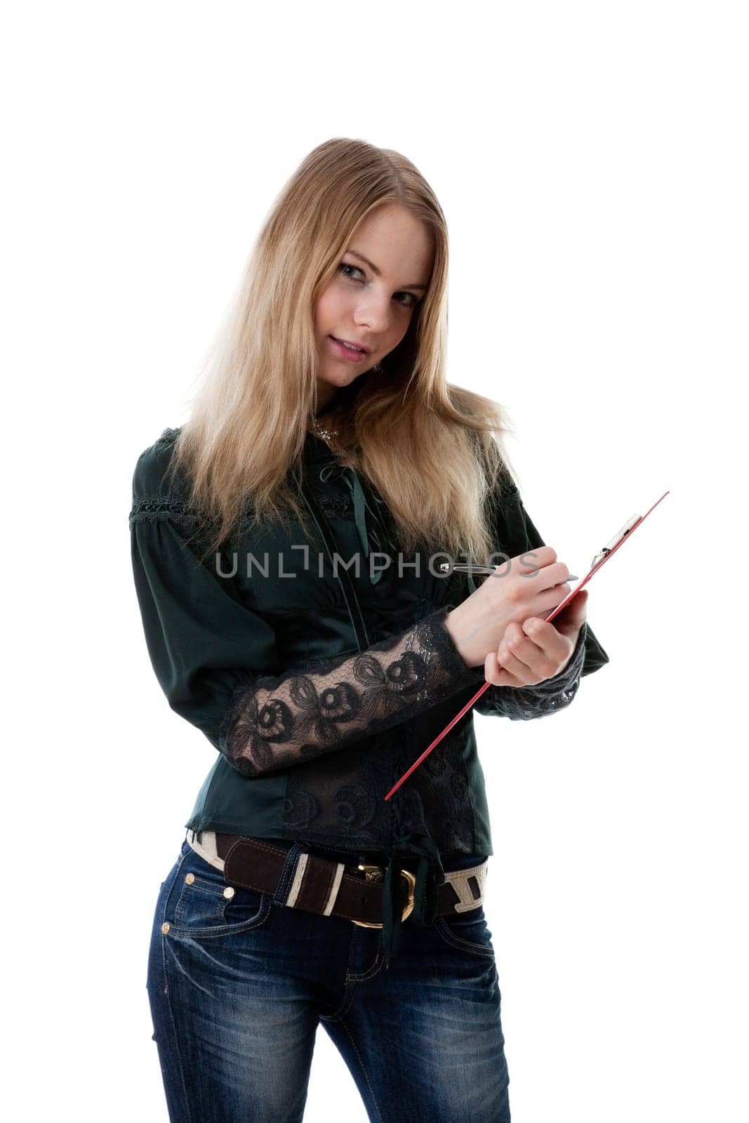The beautiful girl stands with a clipboard and the pen in hands on a white background.