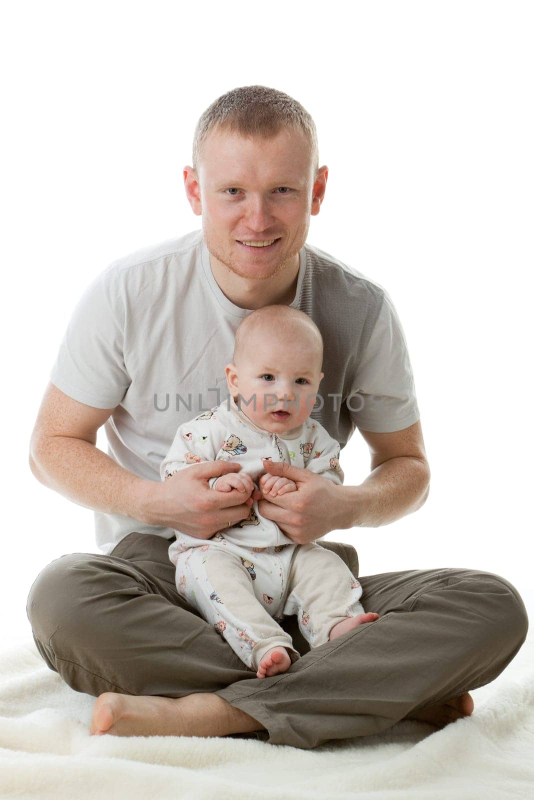 Happy family. Father and his sweet baby on a white background.