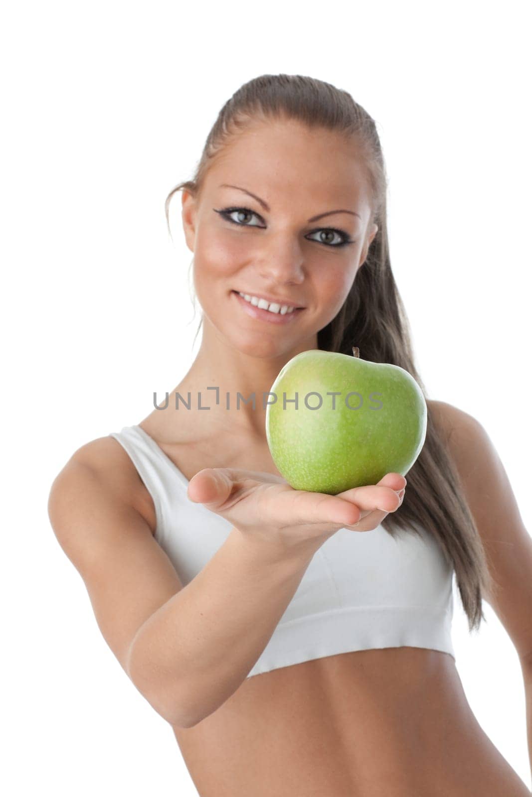 Young beautiful girl with apple in hands on a white background. Healthy food concept