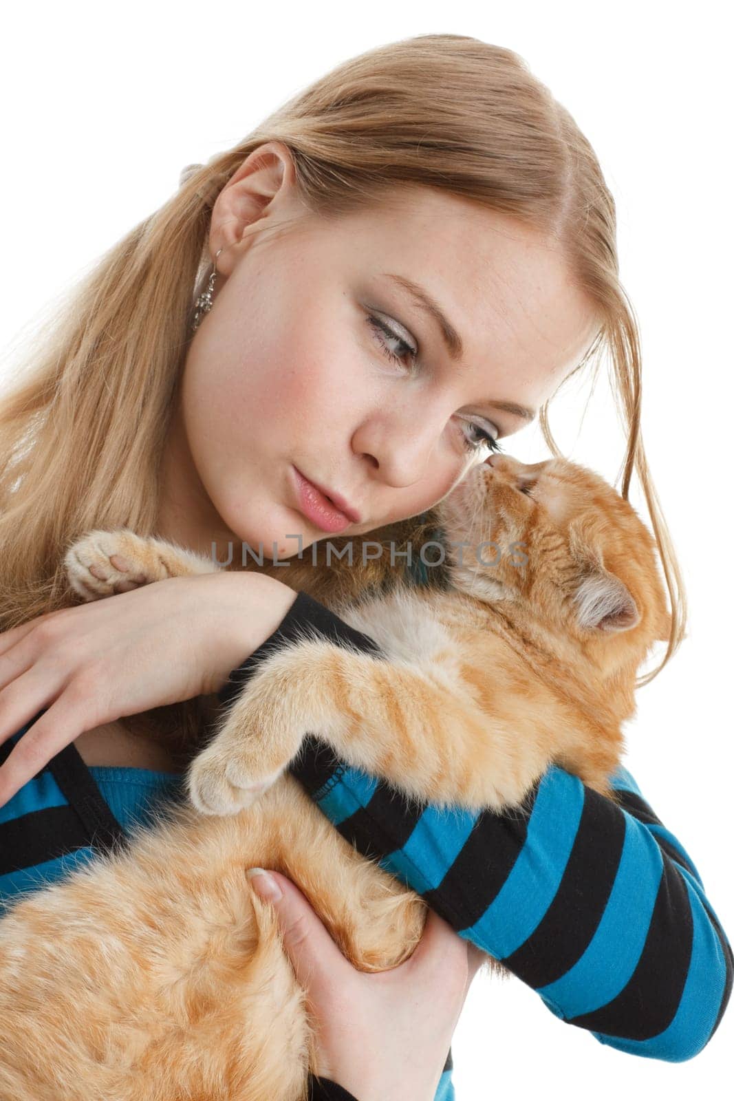 The happy young woman with a small amusing kitten on a white background.