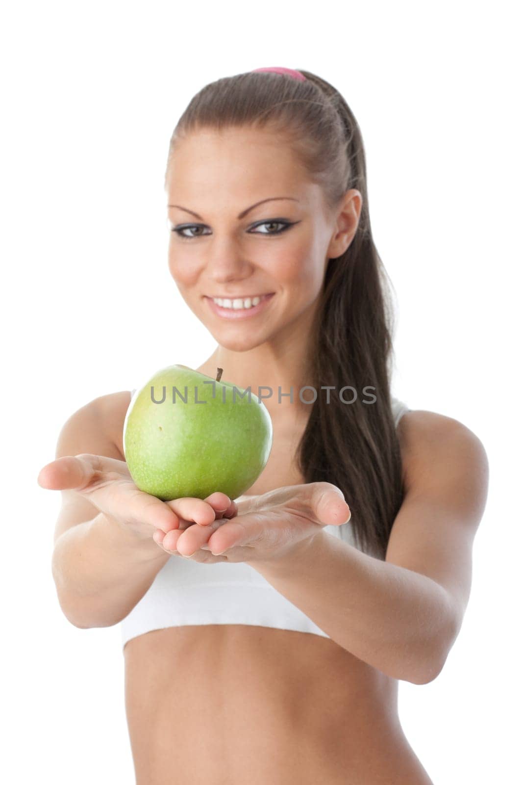 Young beautiful girl with apple in hands on a white background. Healthy food concept