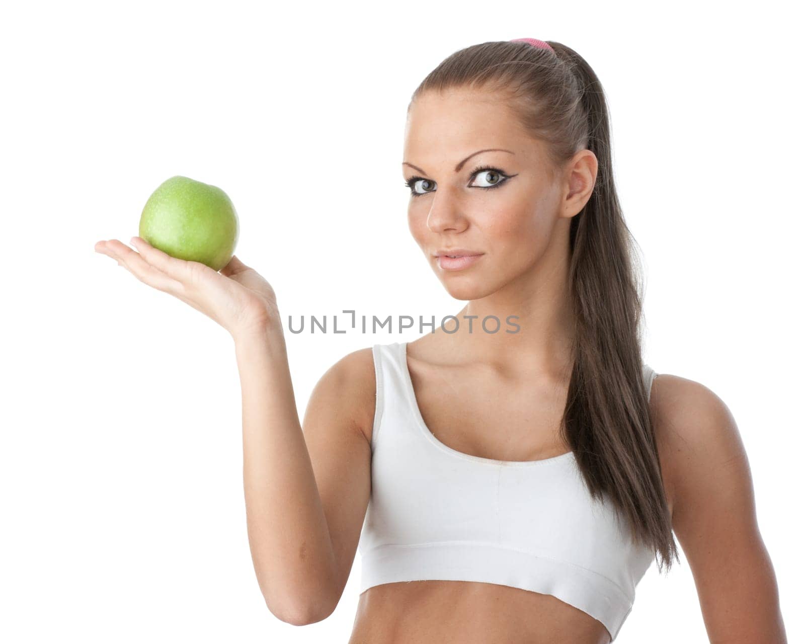 Young beautiful girl with apple in hands on a white background. Healthy food concept