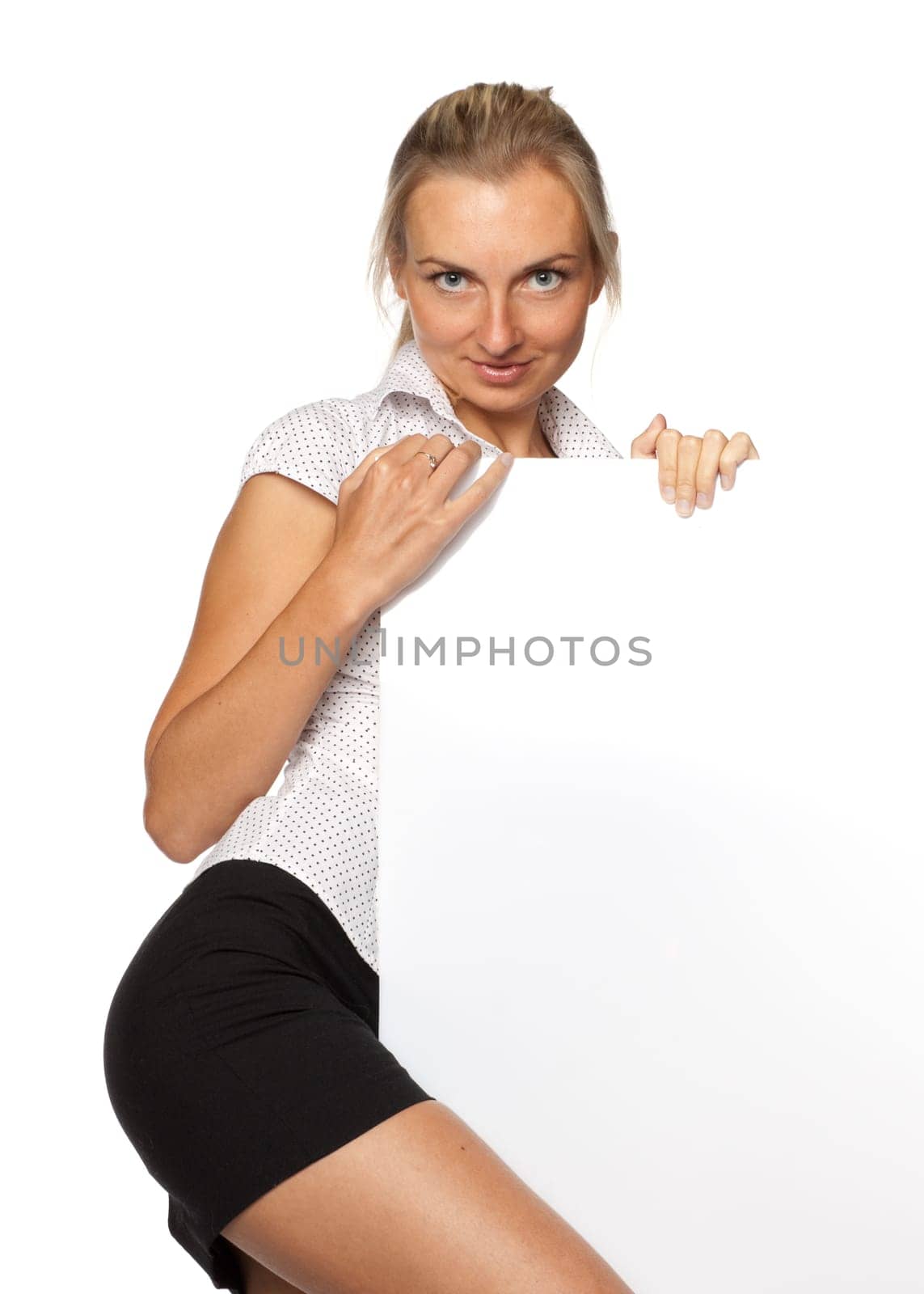 Pretty woman holding a blank billboard over white background