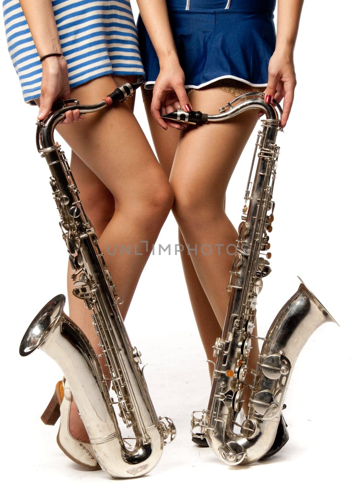 Girl with saxophone on a white background