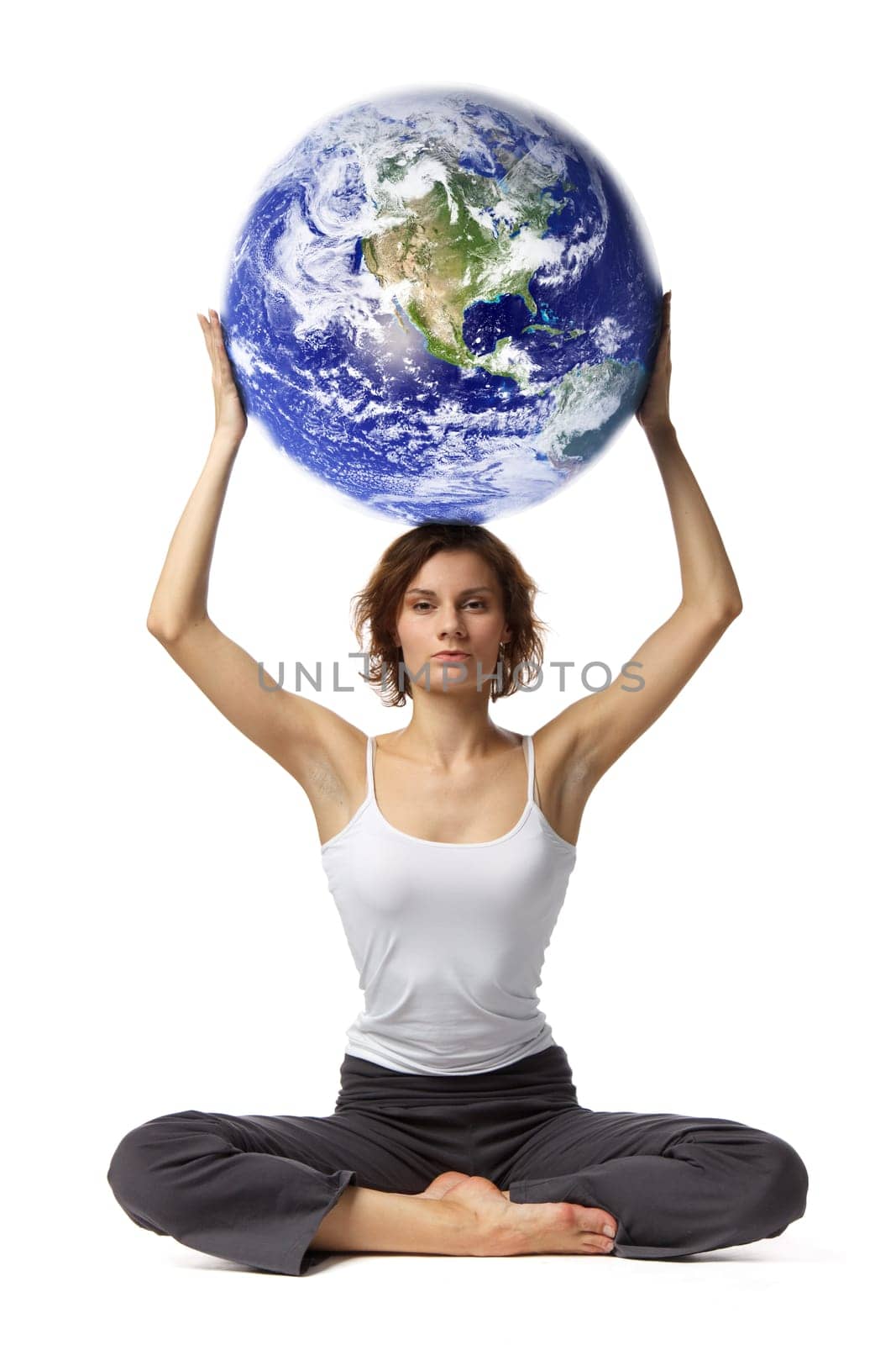 Young beautiful woman with globe on a white background.