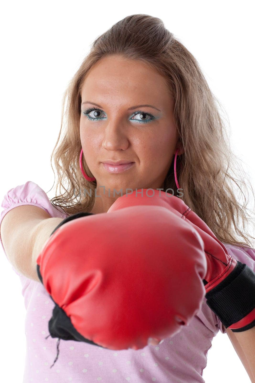 Sporty girl in red fighting gloves on a white background.