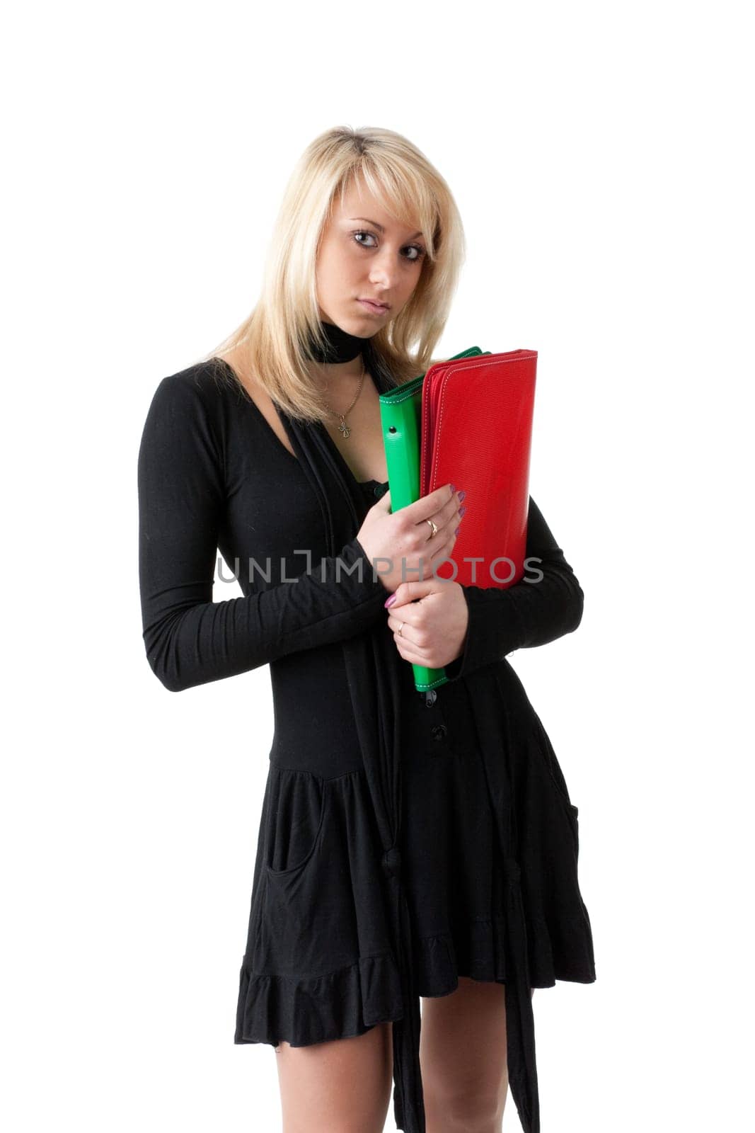 The beautiful woman stand with coloured folders on a white background.