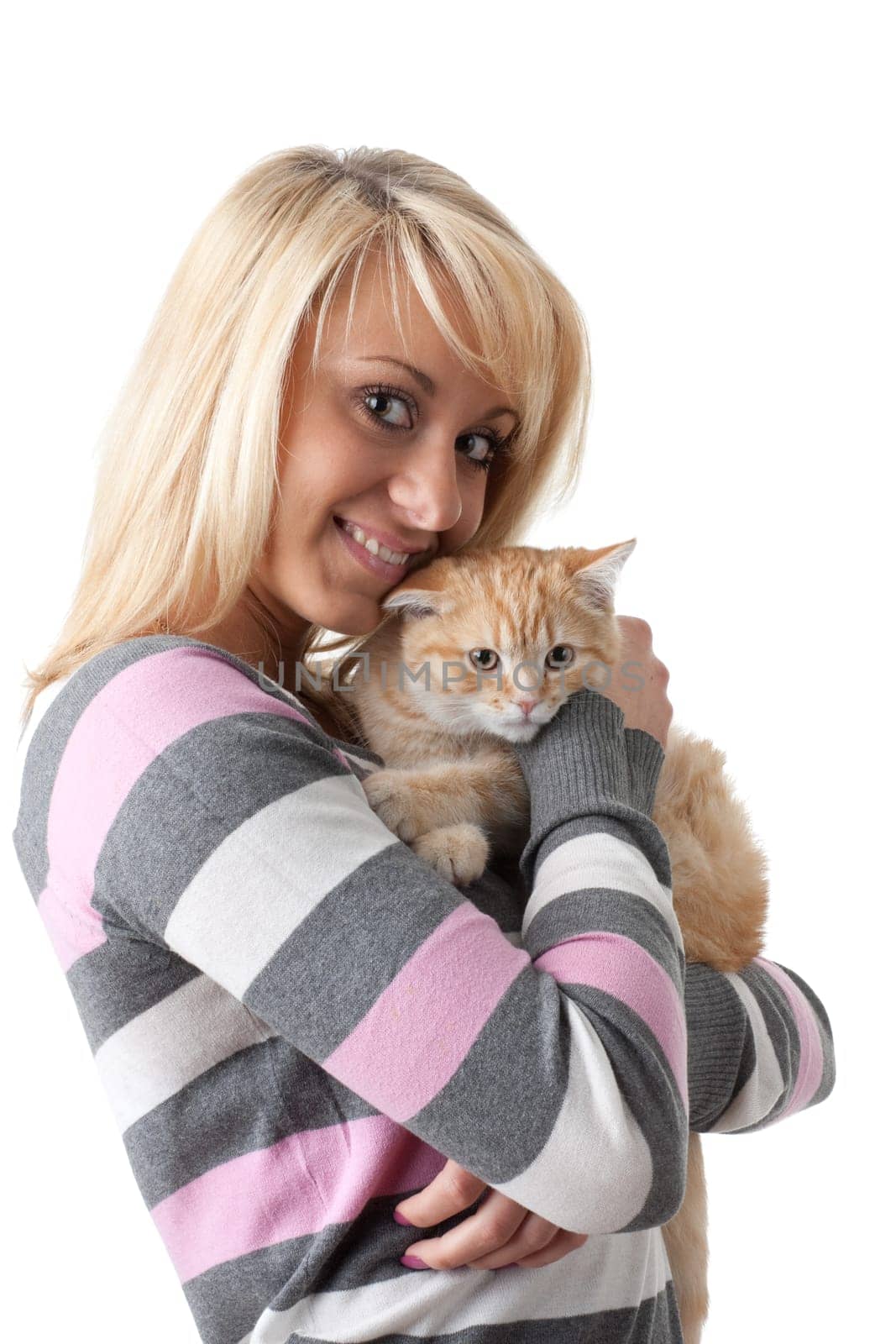 The happy young woman with a small amusing kitten on a white background.