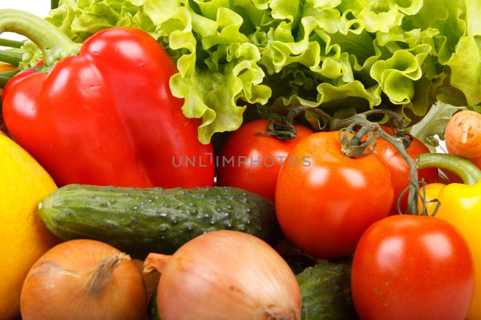 Abstract background from fresh vegetables on a white background.