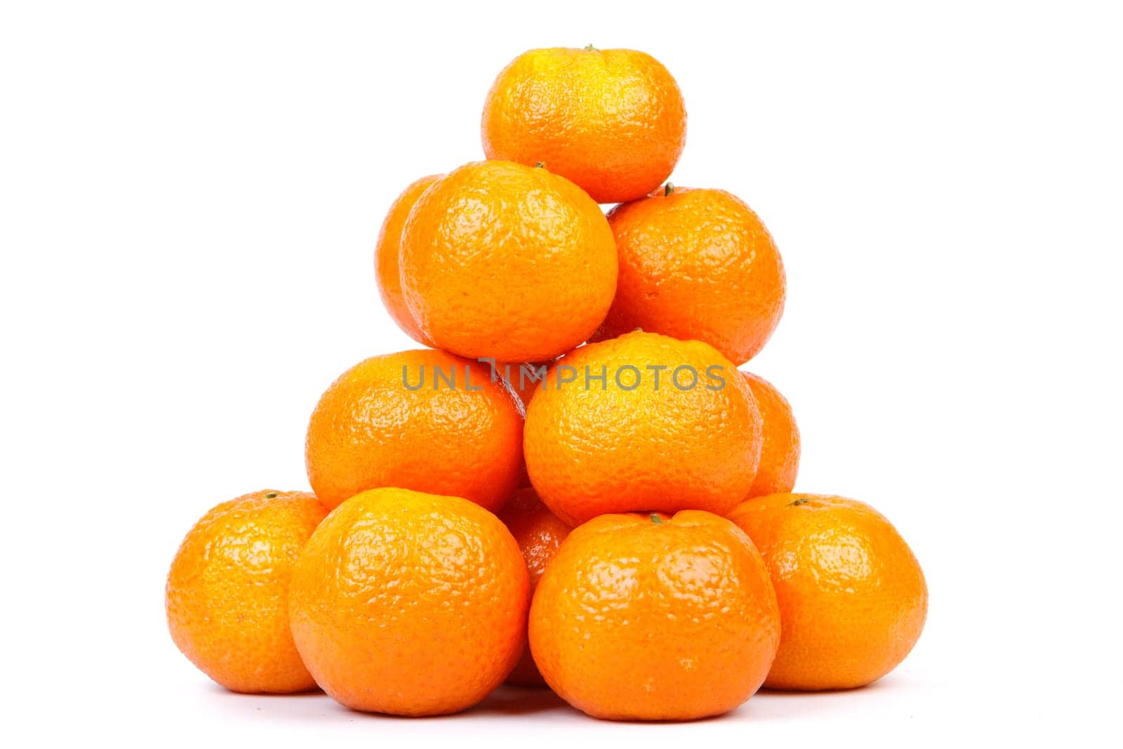Fresh tangerines on a white background. Close up.