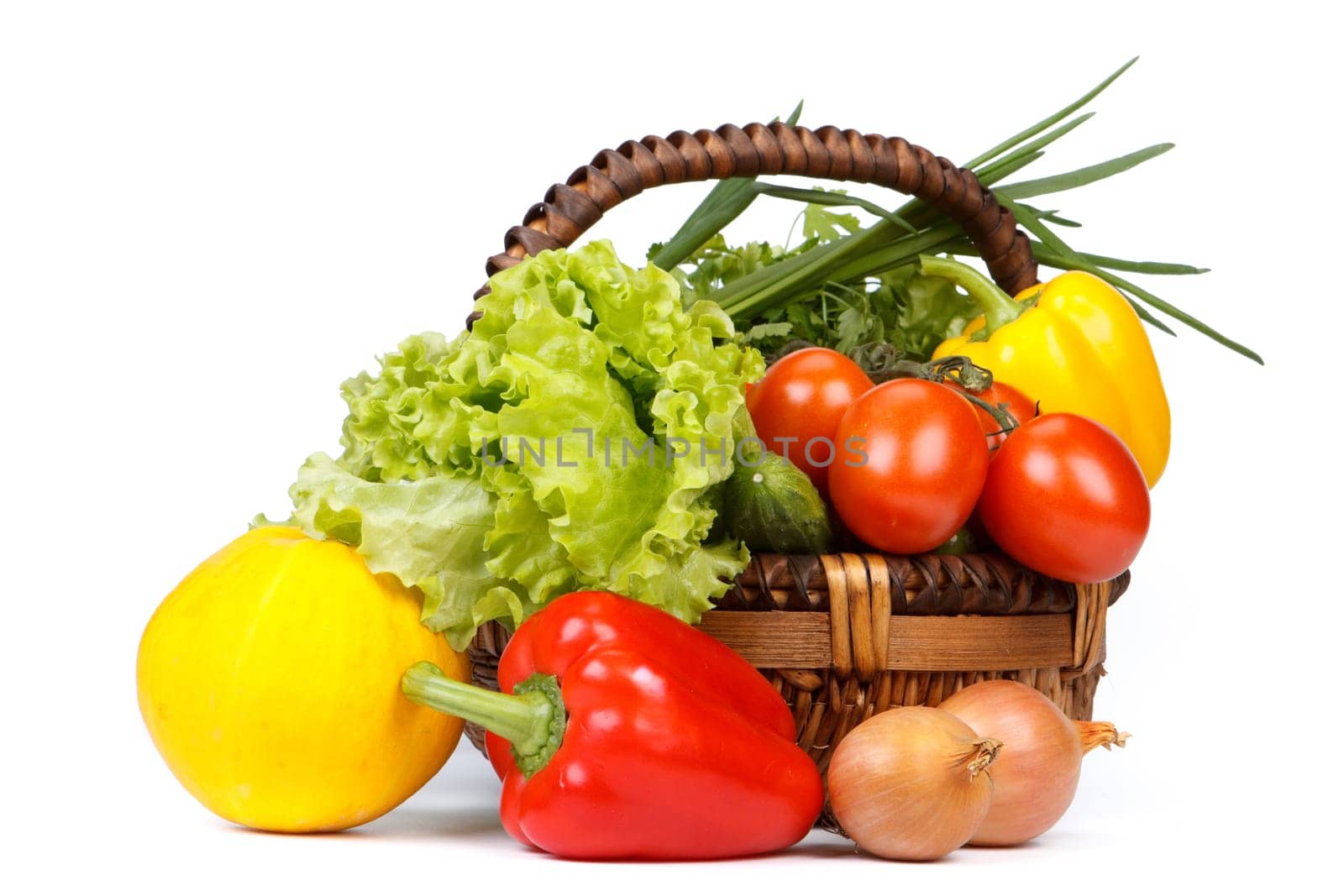 Still-life with fresh vegetables on a white background.