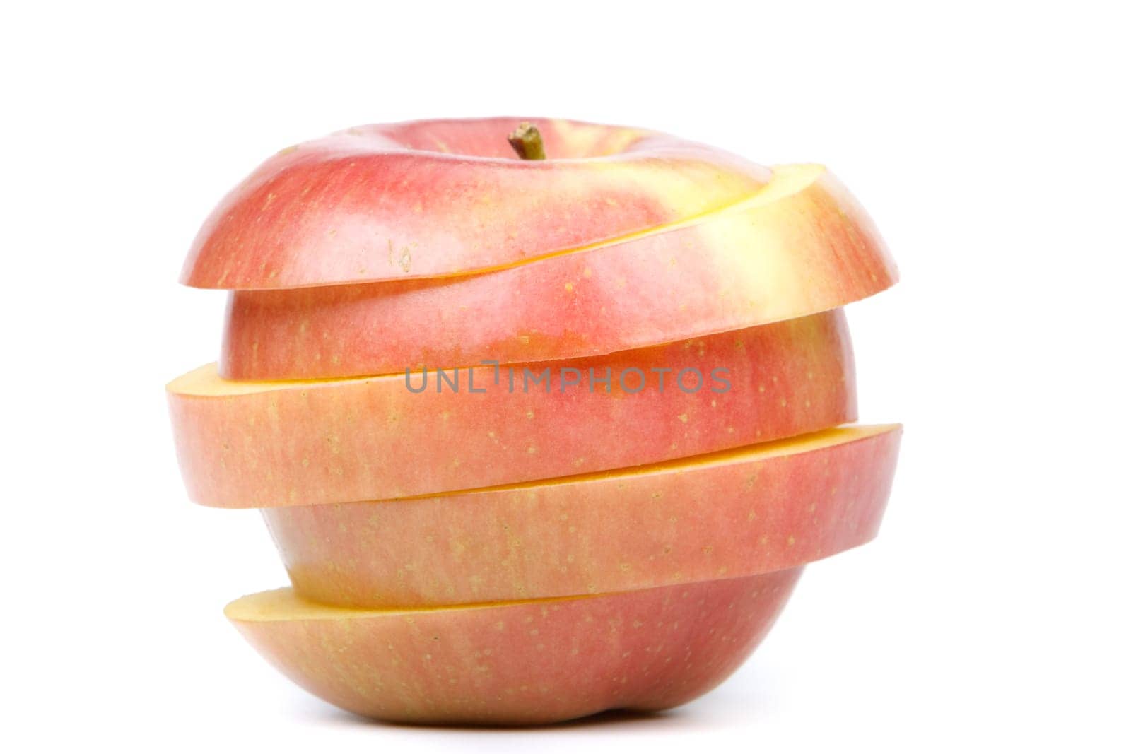 Fresh sliced apple on a white background. Close up.