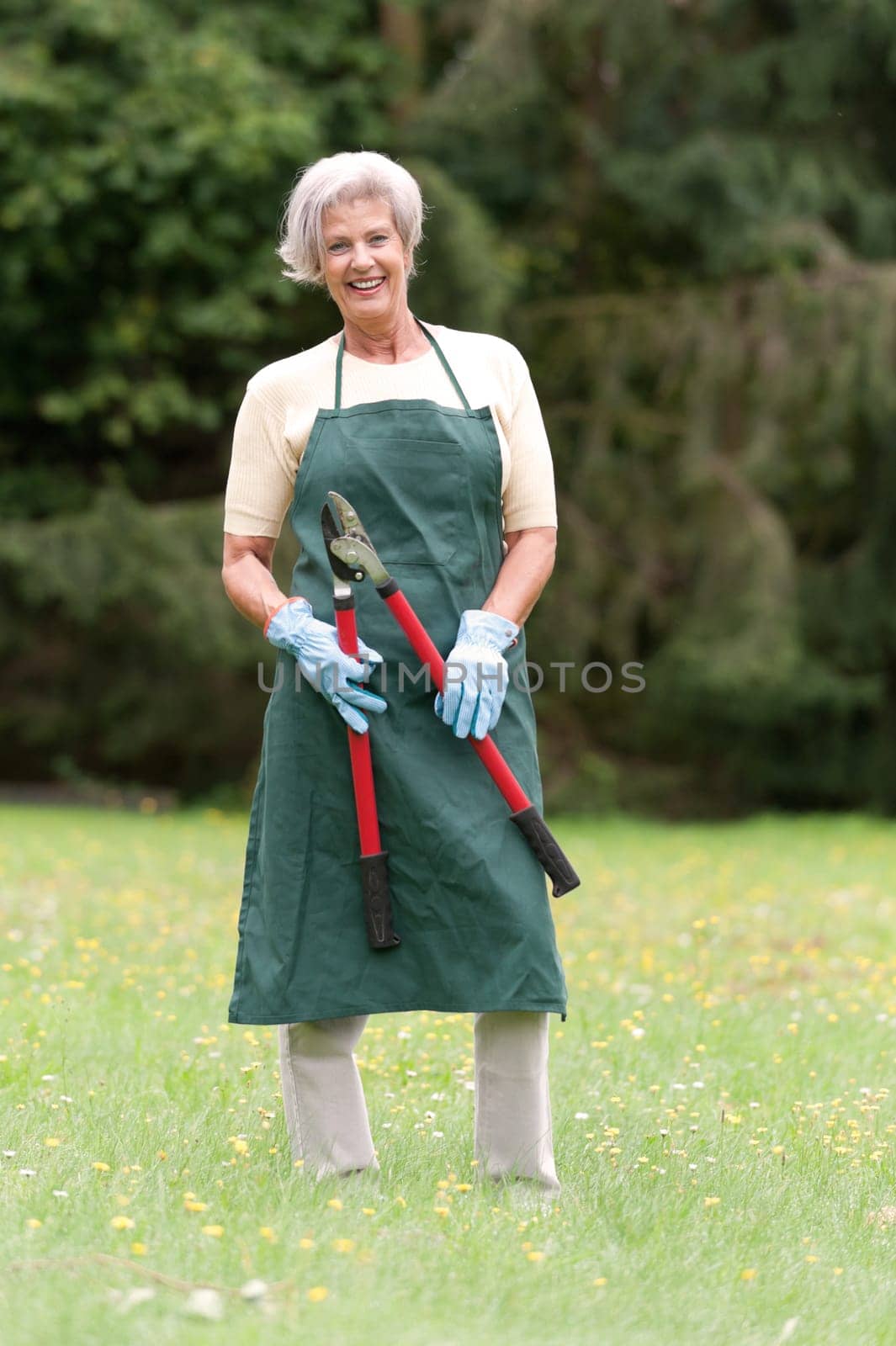 Active senior woman gardening