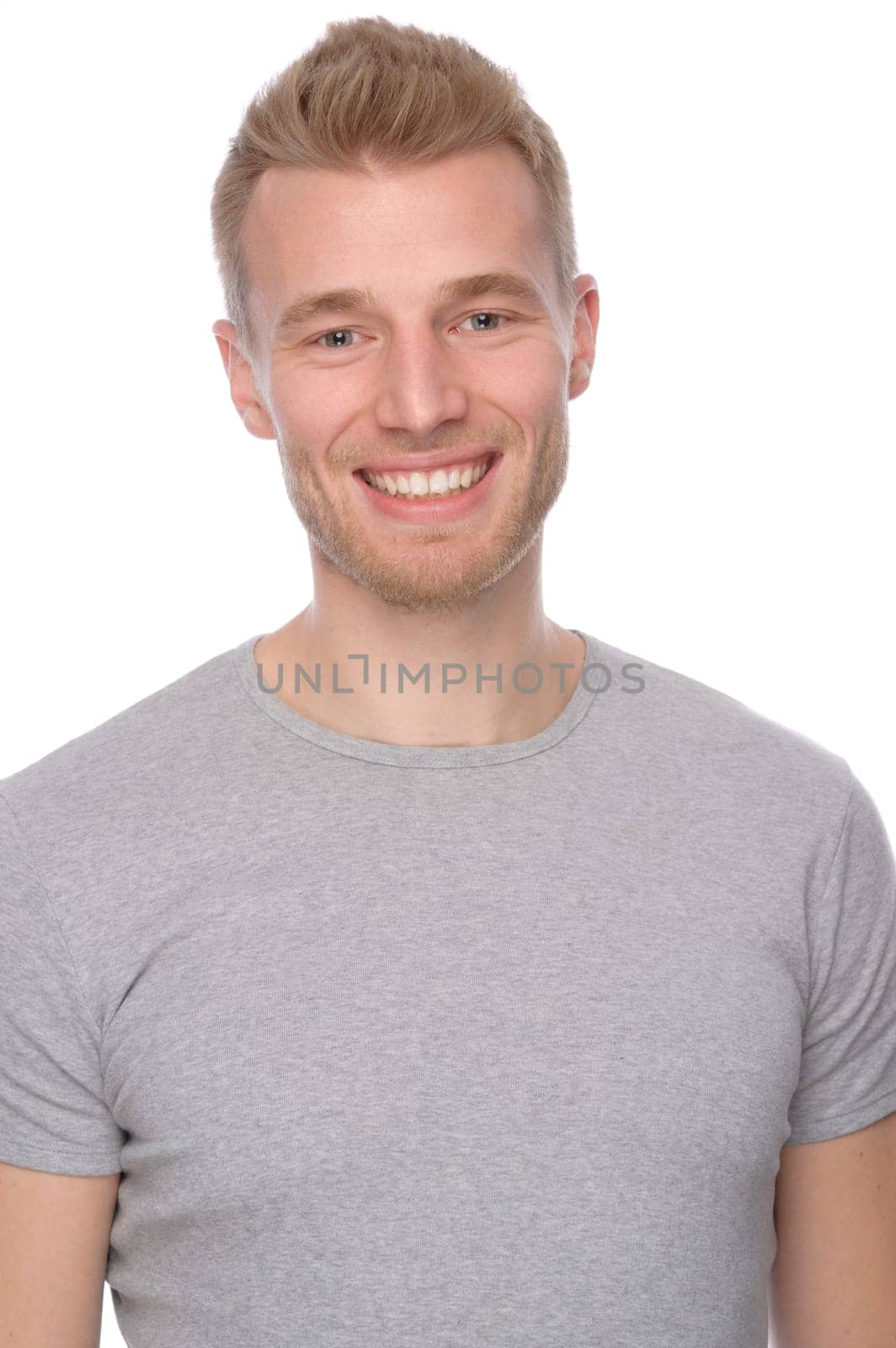 Portrait of a young man showing background