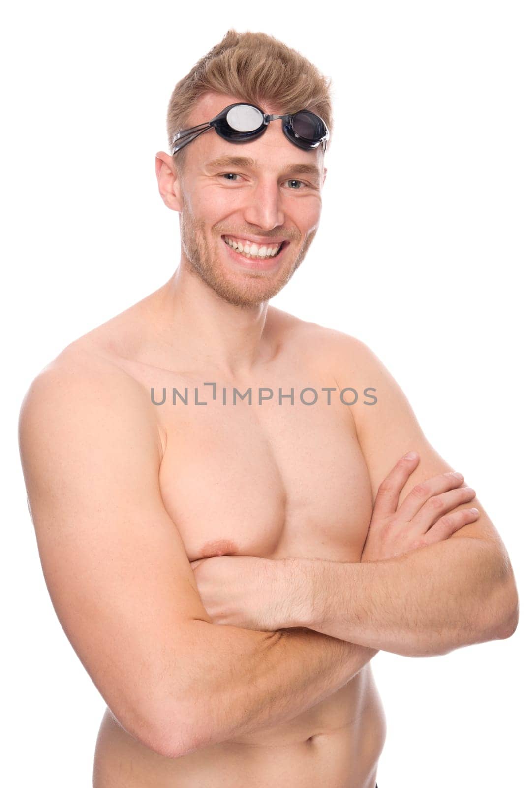 Studio shot of a young swimmer against a white background