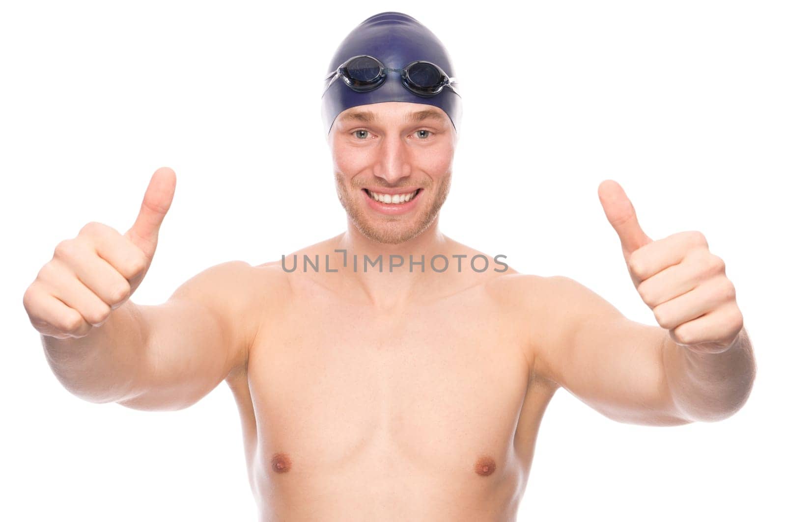 Studio shot of a young swimmer against a white background