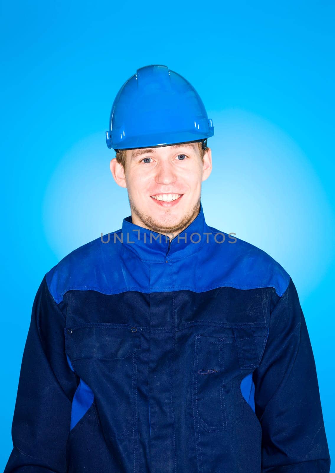 Portrait of a Manual Worker on blue background