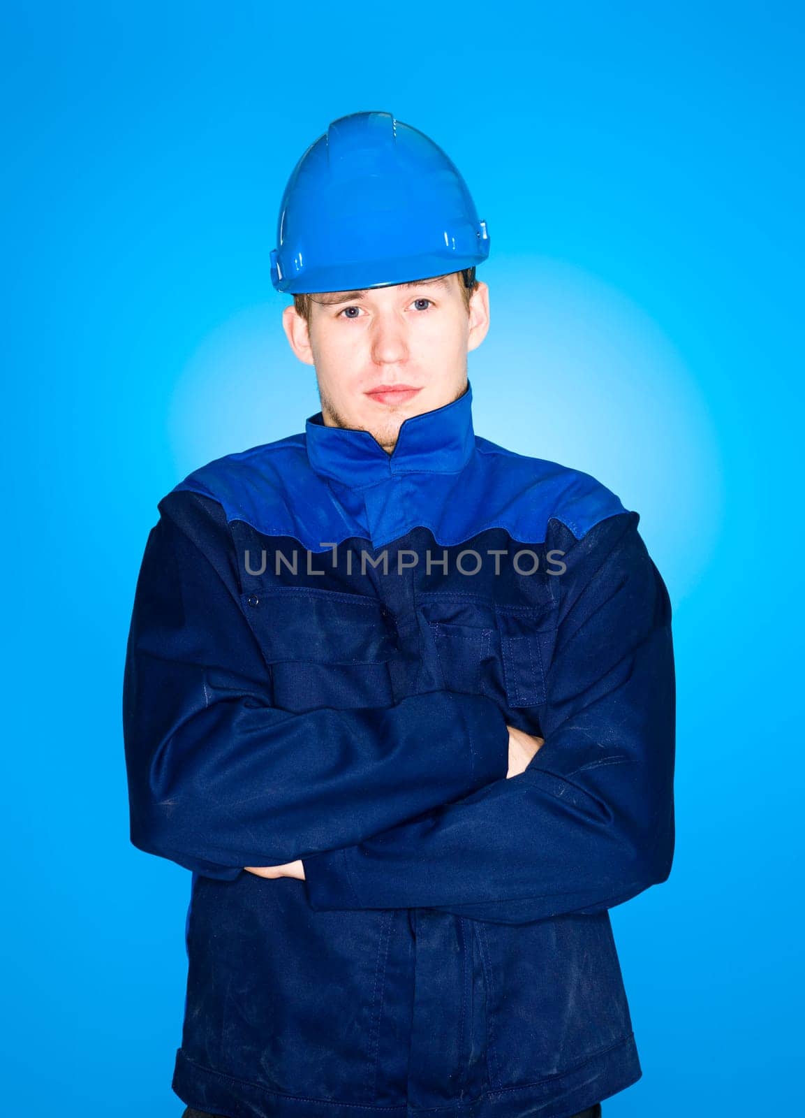 Portrait of a Manual Worker on blue background