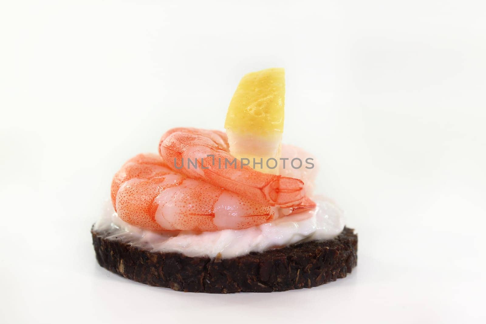 Canape with shrimp,cream cheese and lemon