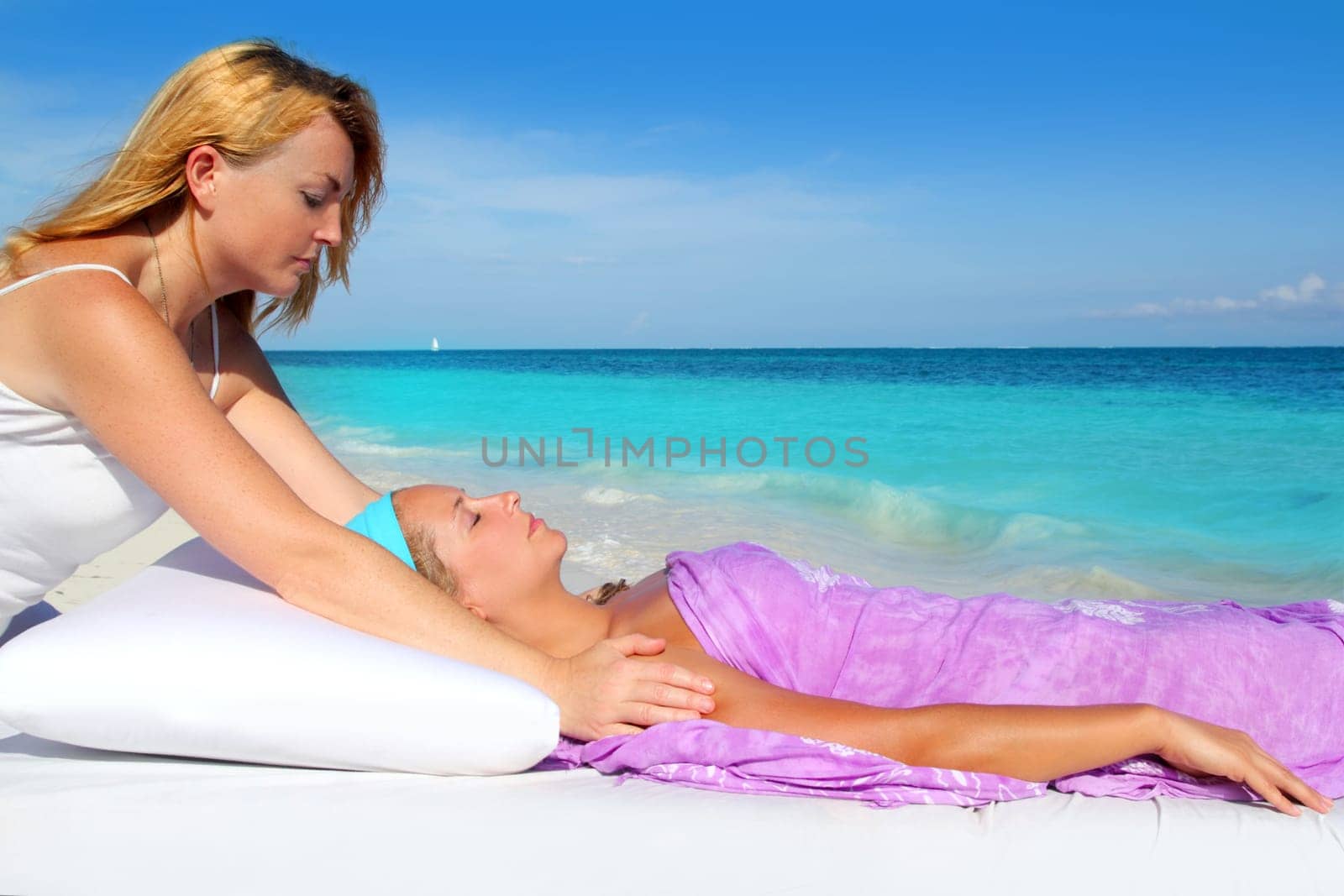 Mayan reiki massage in Caribbean beach woman vacation therapy