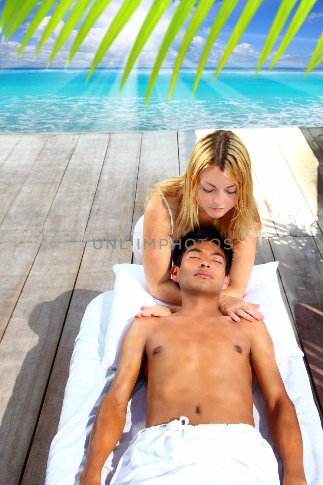 massage therapy stretch head neck outdoor Caribbean beach