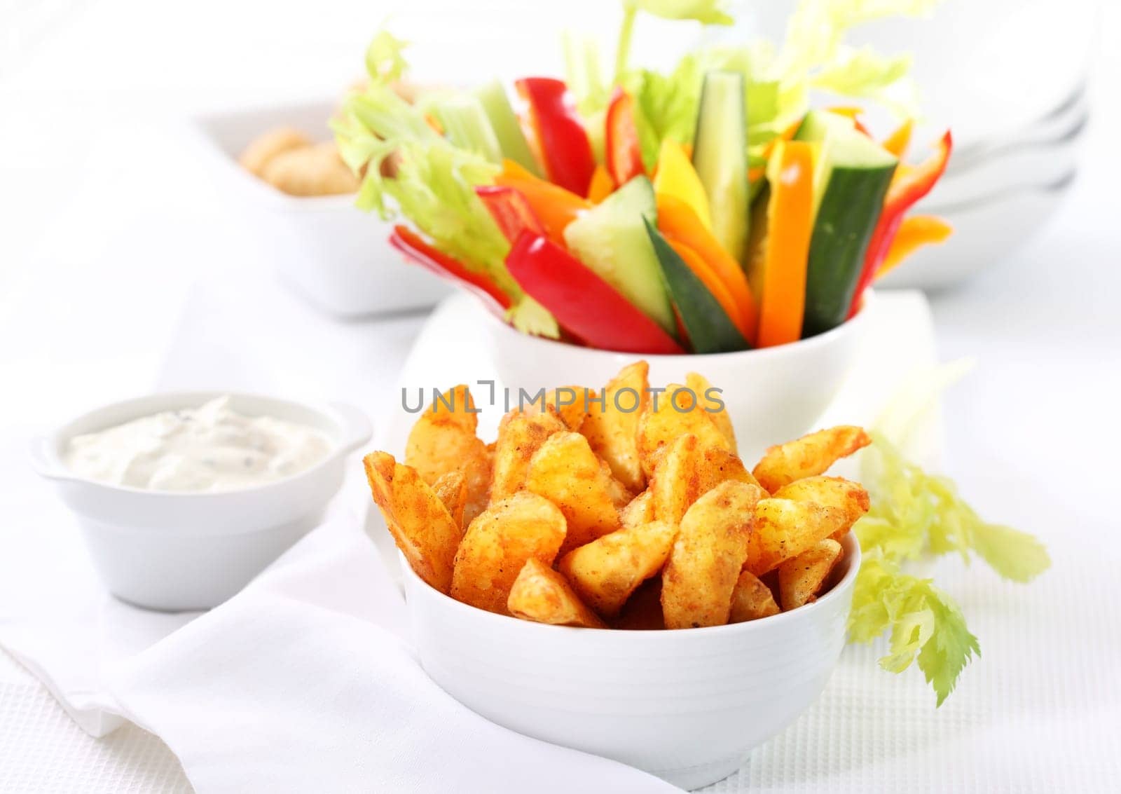 Raw vegetable and wedges with cream cheese dip