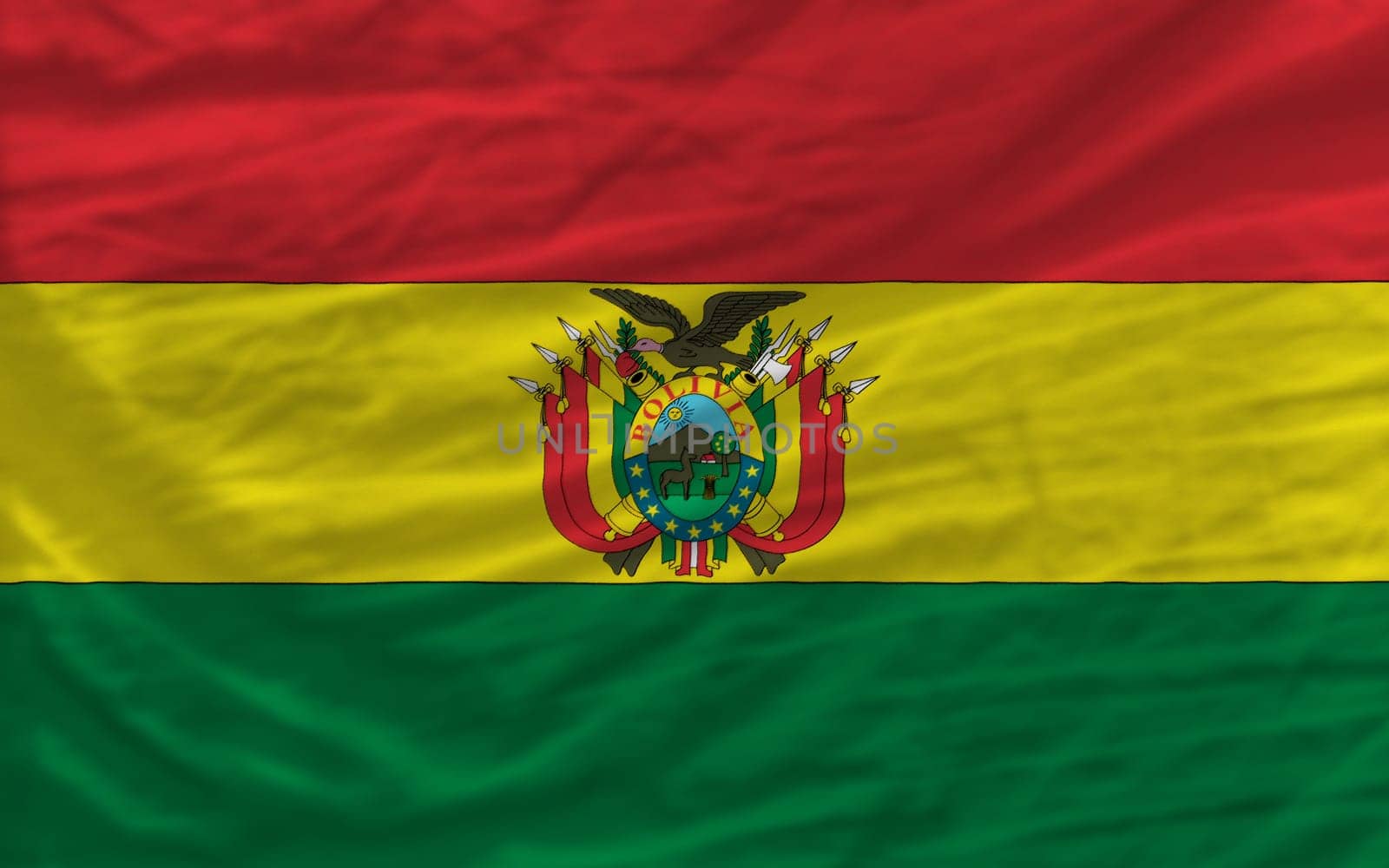 complete national flag of bolivia covers whole frame, waved, crunched and very natural looking. It is perfect for background