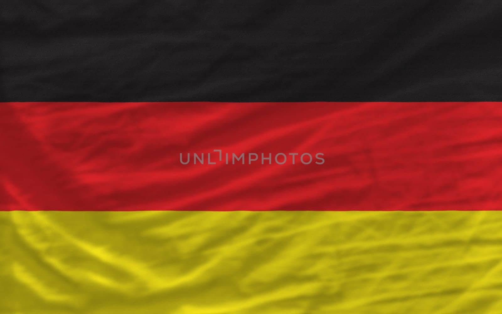 complete national flag of germany covers whole frame, waved, crunched and very natural looking. It is perfect for background