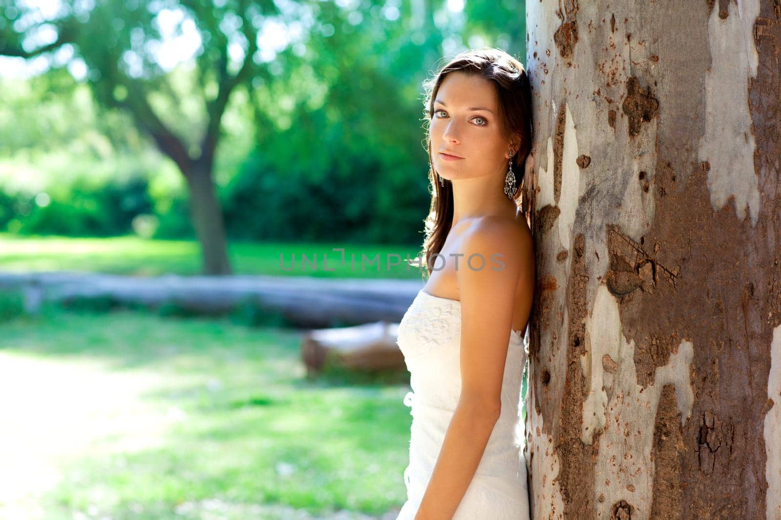 bride woman happy posing in outdoor tree park