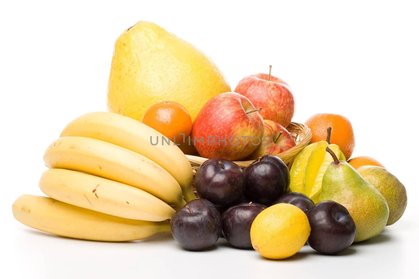 Various fresh fruits on a white background