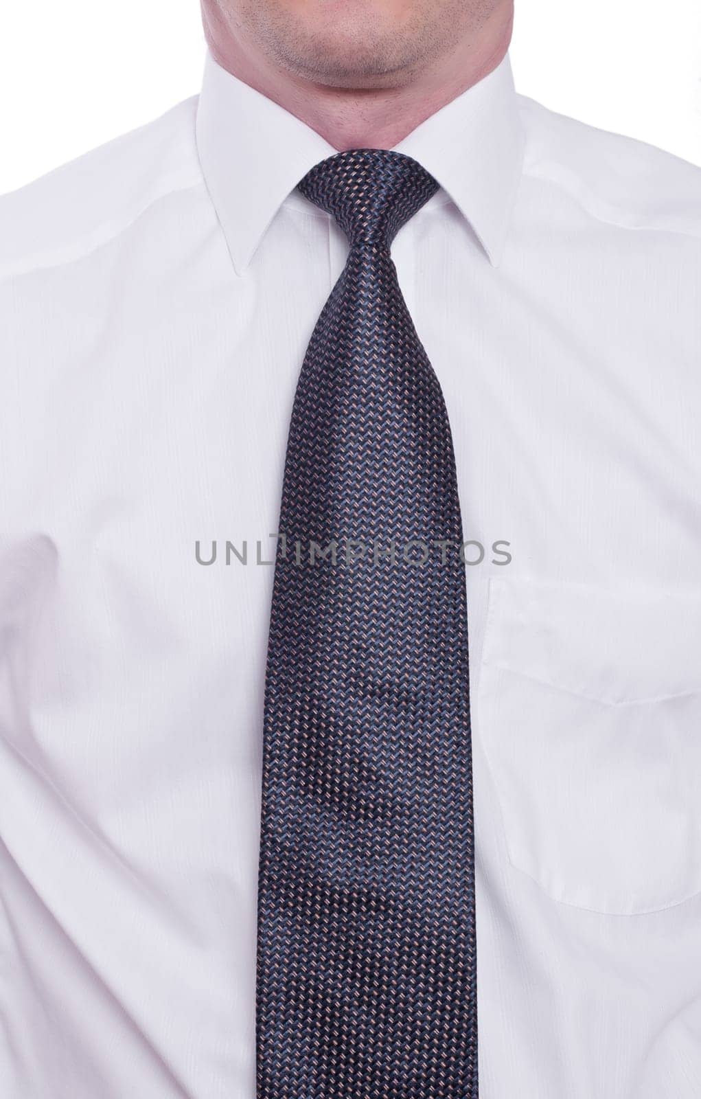 A man ties a tie