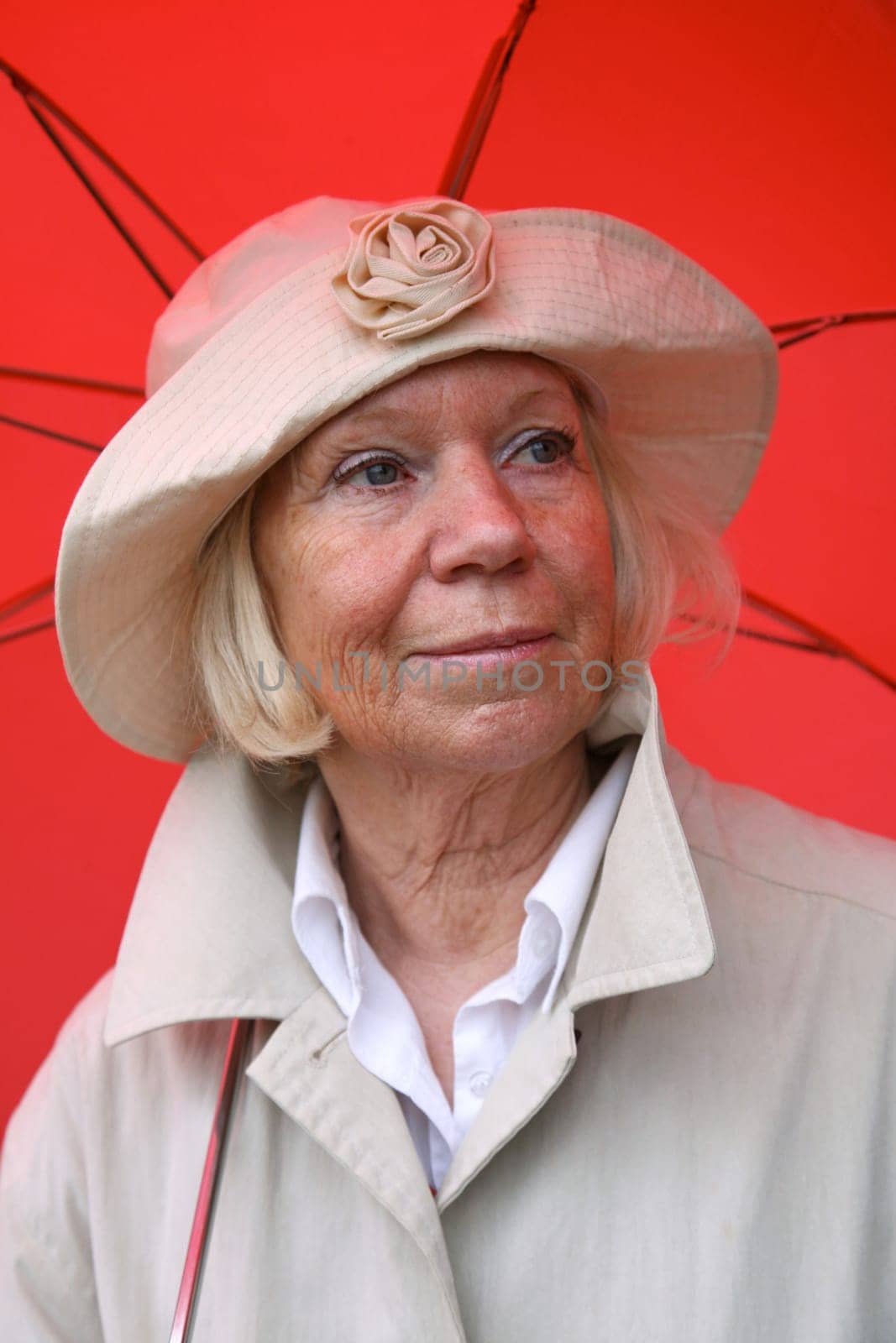 Senior woman with umbrella