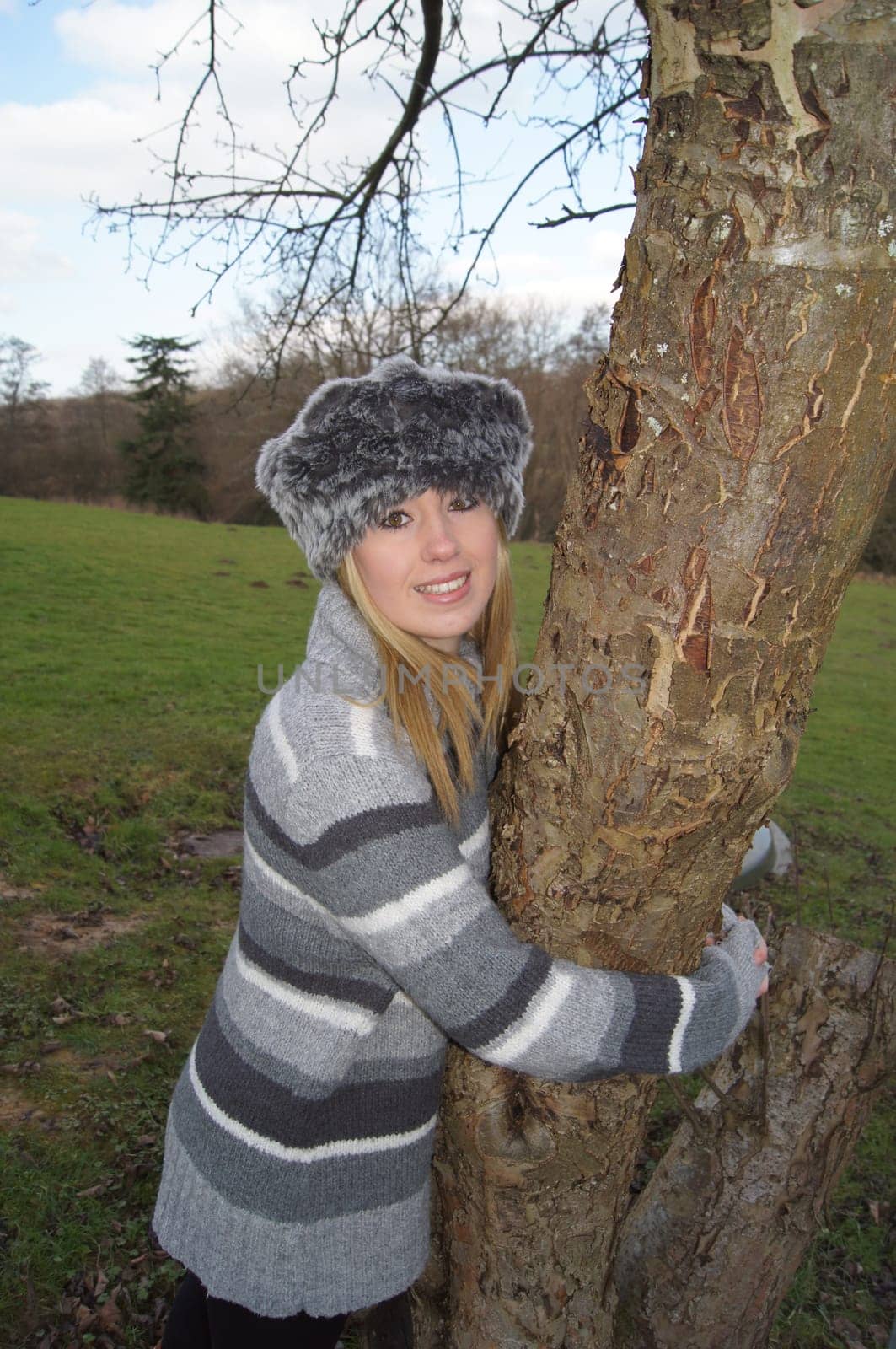 Girl Hugging a Tree