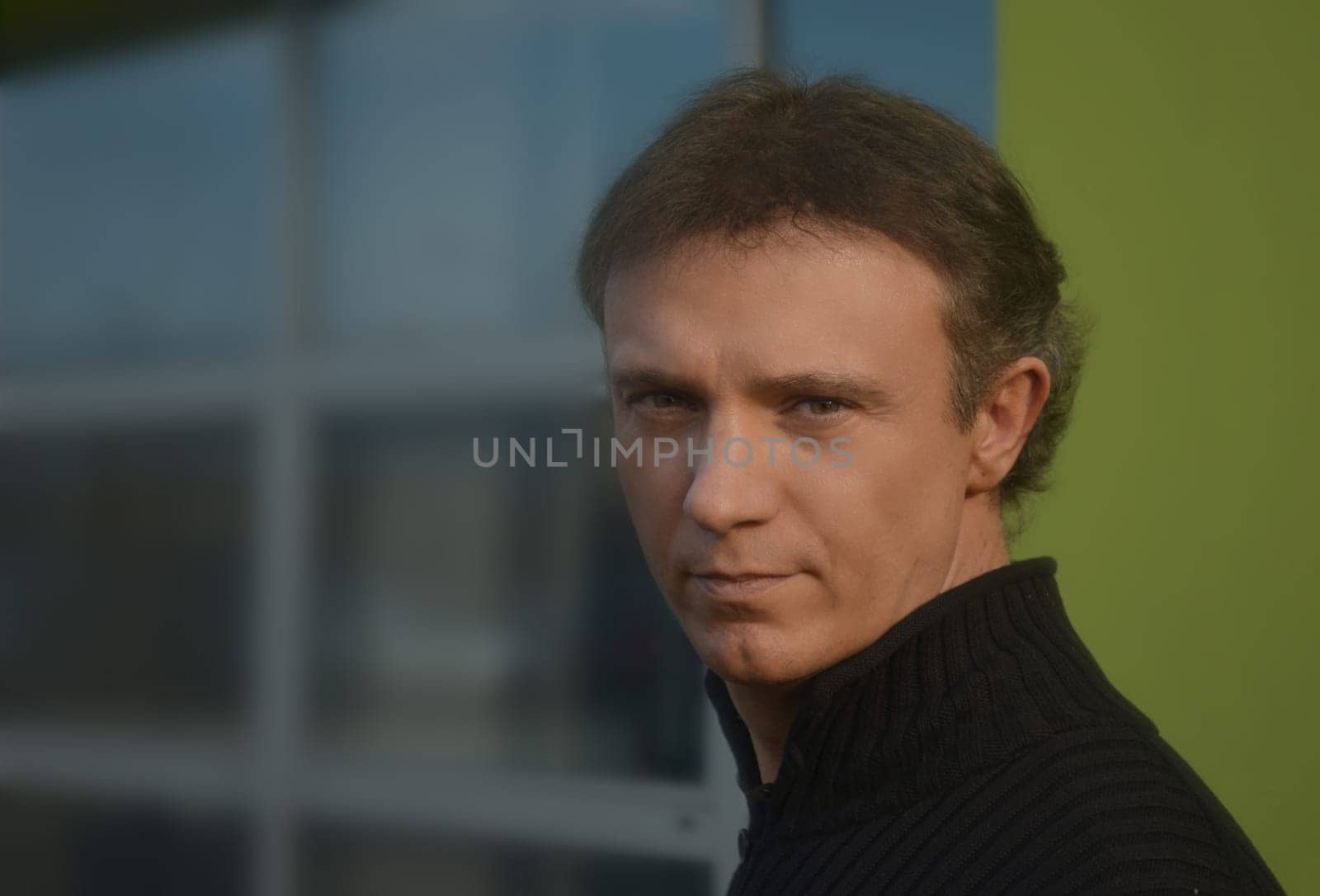 Good looking guy outside office or modern building