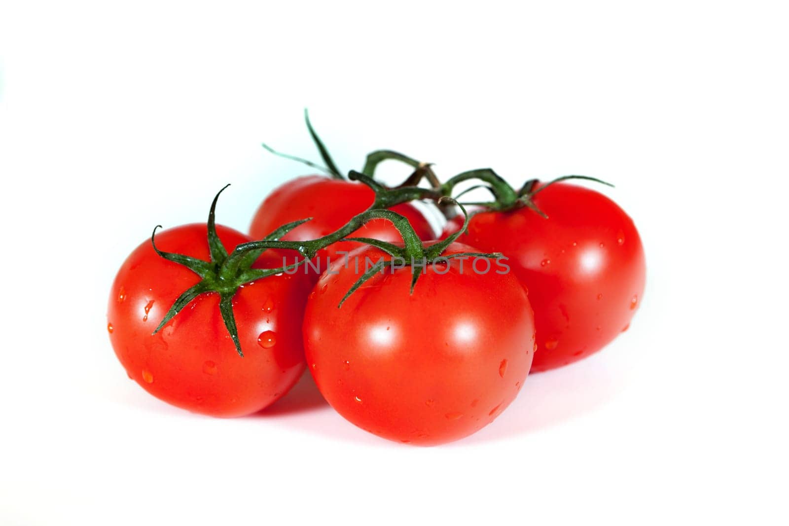 Tomato,fresh red vegetables against white background
