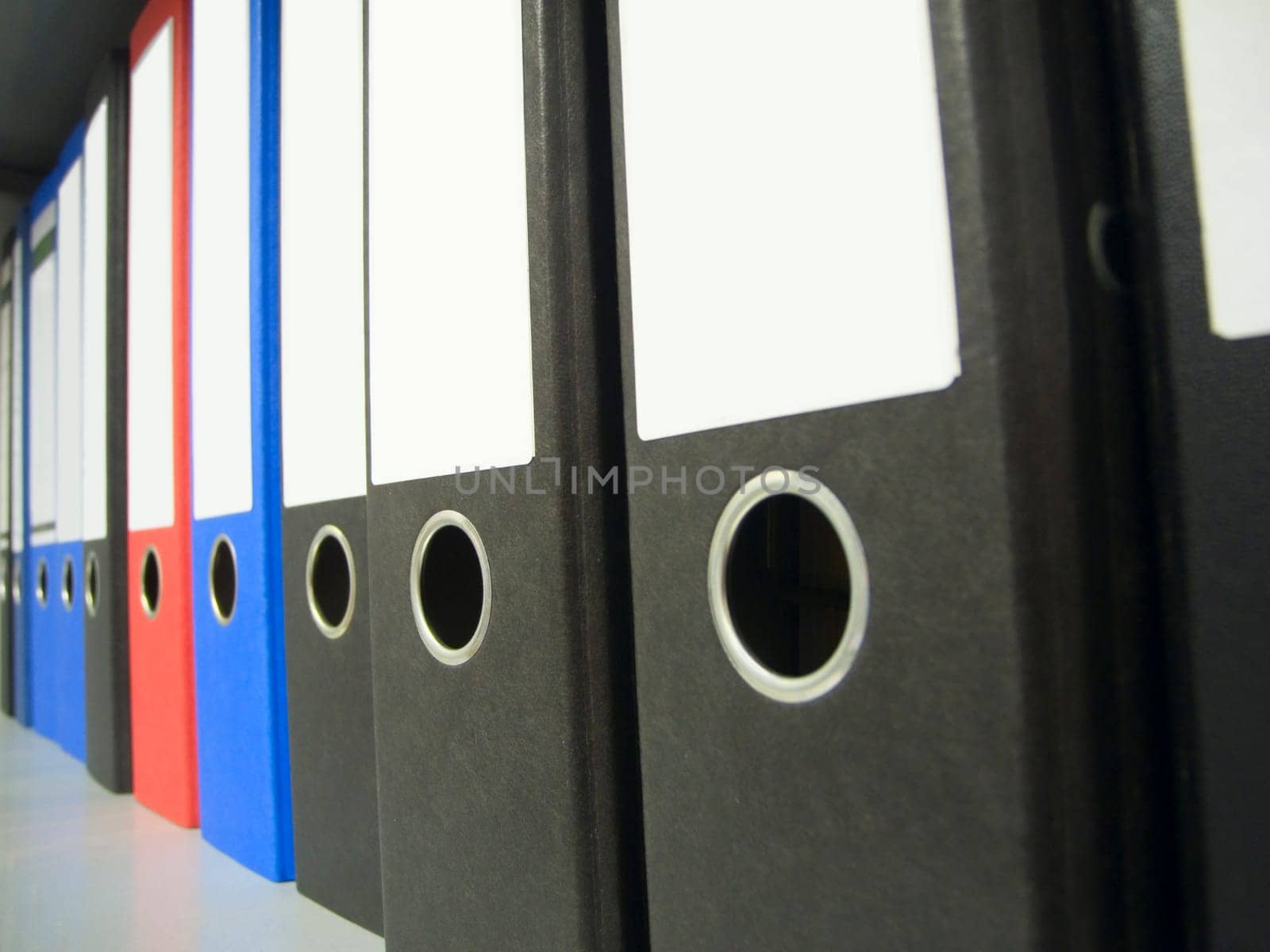 Ring binder in a row in perspective view